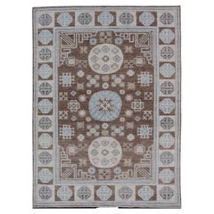 Tappeto Khotan afgano con medaglione geometrico disegnato e annodato a mano in lana