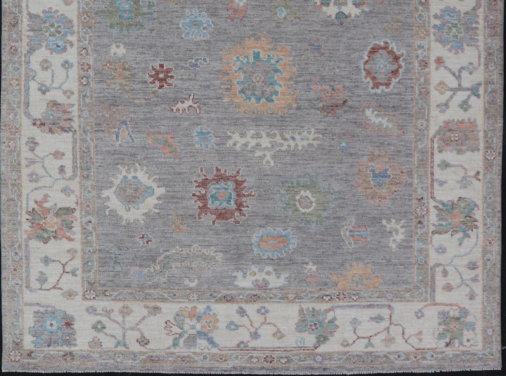 Contemporary Hand Knotted Floral Oushak With a Gray Background And Multi-Colors For Sale