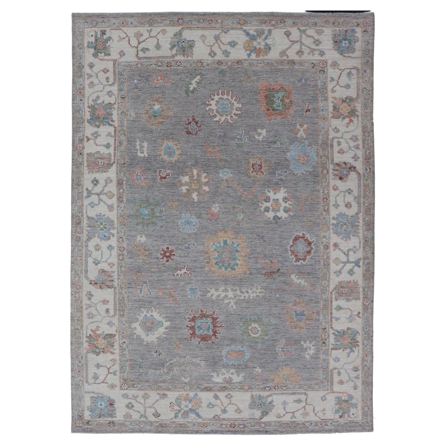 Hand Knotted Floral Oushak With a Gray Background And Multi-Colors