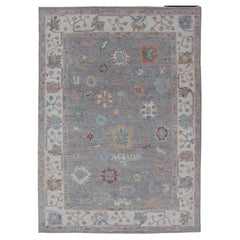 Hand Knotted Floral Oushak With a Gray Background And Multi-Colors