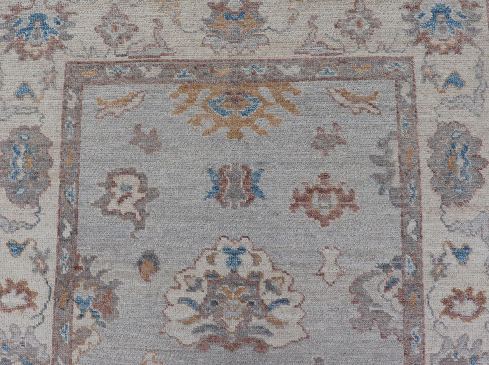 Floral Oushak with Muted Gray Background and Cream Border In New Condition For Sale In Atlanta, GA