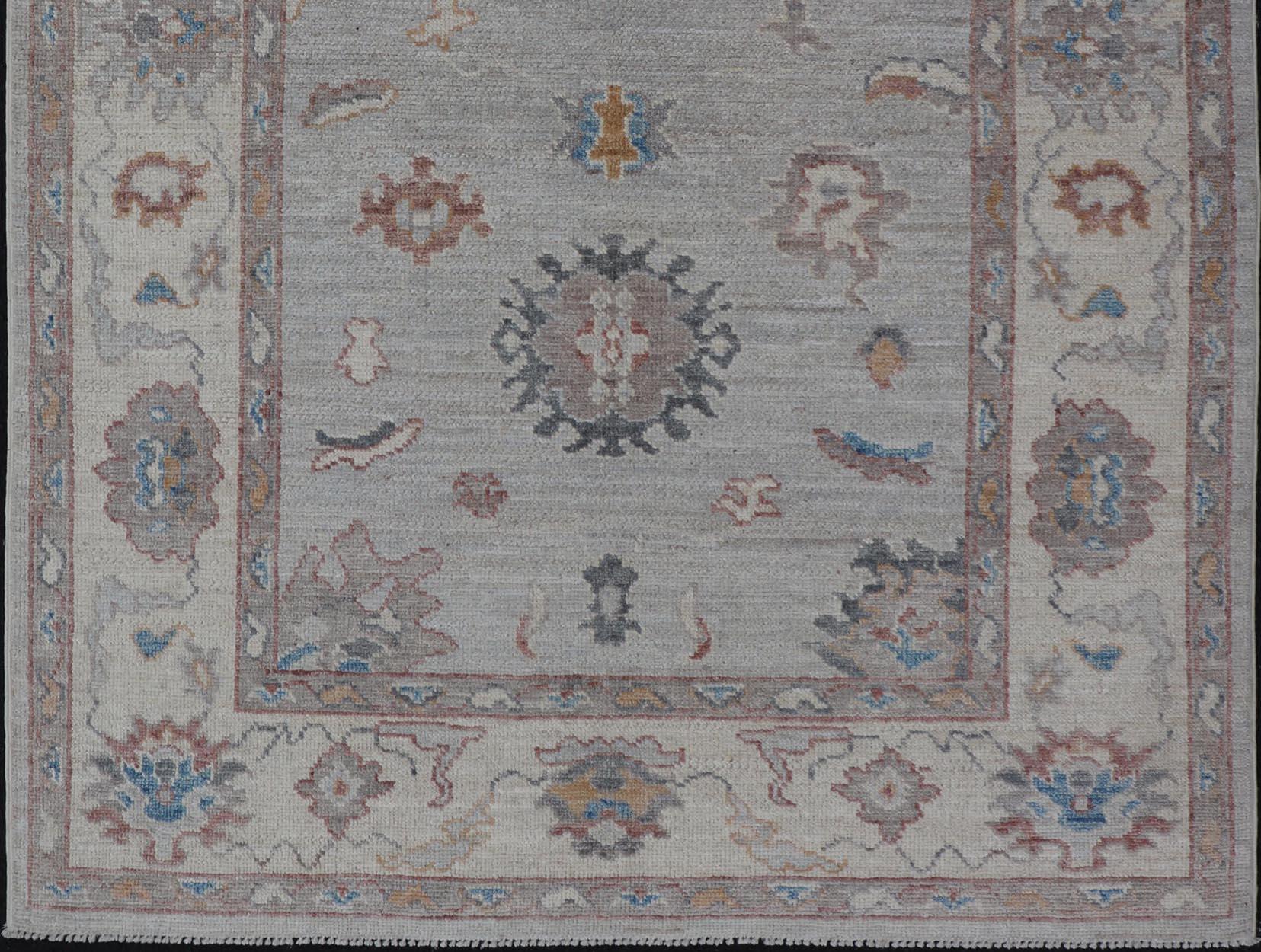 Wool Floral Oushak with Muted Gray Background and Cream Border For Sale