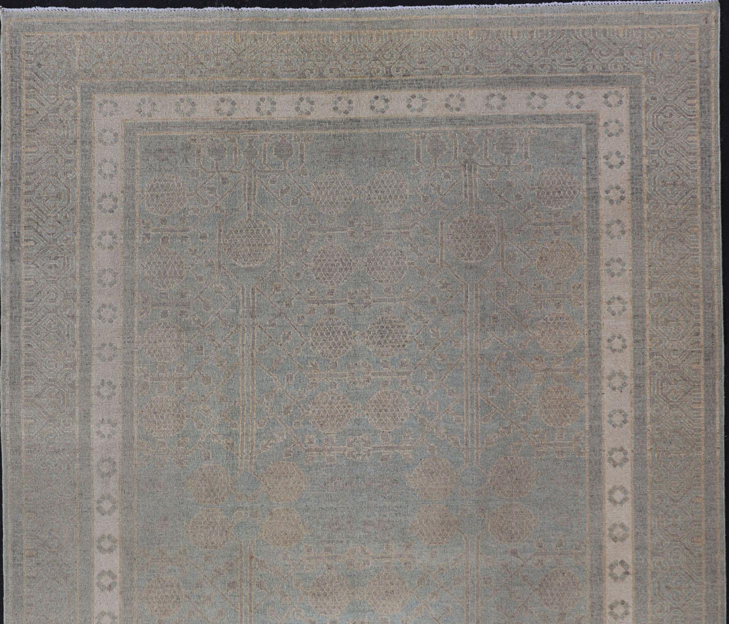 Geometric All-over Khotan with Pomegranate. Keivan Woven Arts / rug MP-1310-613, country of origin / type: Afghanistan / Khotan. 

This Khotan features a geometric all-over Pomegranate design flanked by a repeating pattern in the border. The