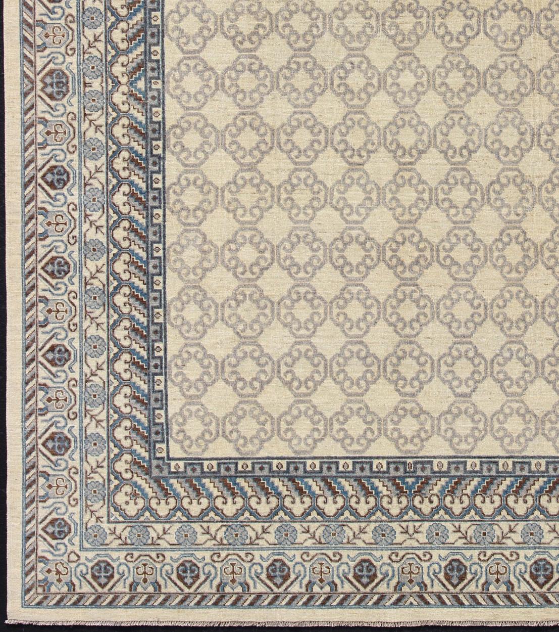 Made in Afghanistan, this rug is made with finest wool and all over tribal Khotan design in the border and the background. Keivan Woven Arts / Rug 1912-262, country of origin / type: Afghanistan / Khotan

Measures: 9'8 x 12'11.

This Khotan