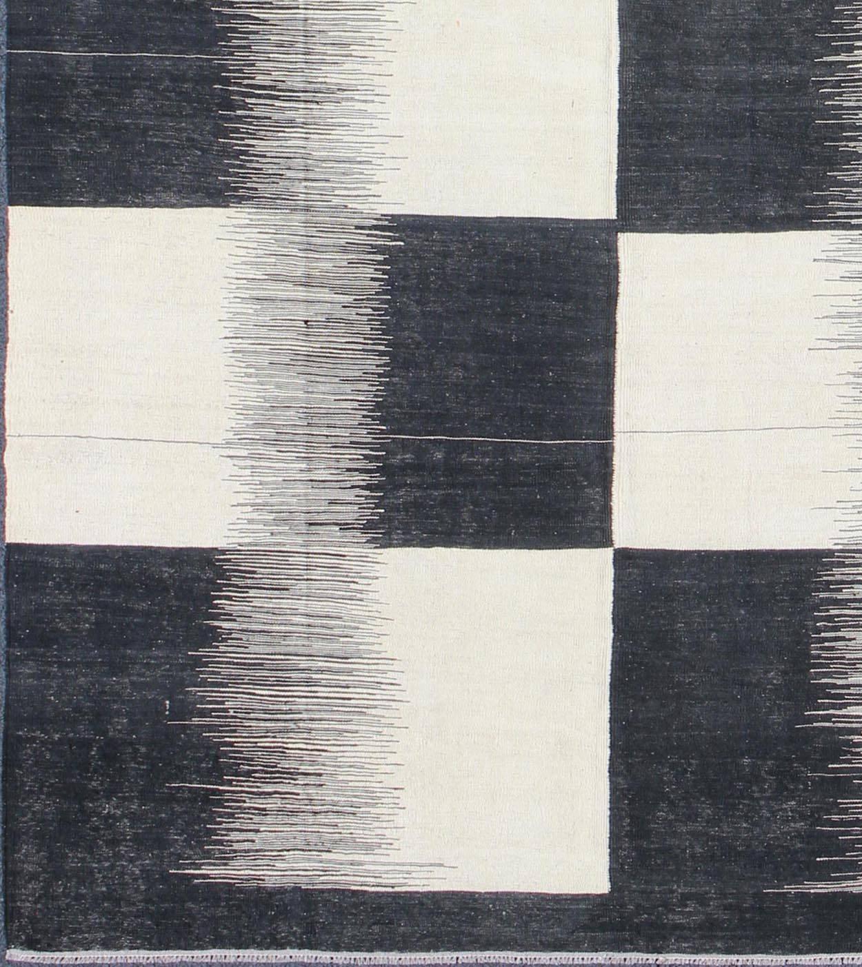 Afghan Modern Kilim Rug with Black, White, and Gray Large Block and Checkerboard Design, rug mse-3, country of origin / type: Afghanistan / Kilim.

This designer Kilim is decorated with a large scale checkerboard pattern. 
Measures: 8'2 x 12'.