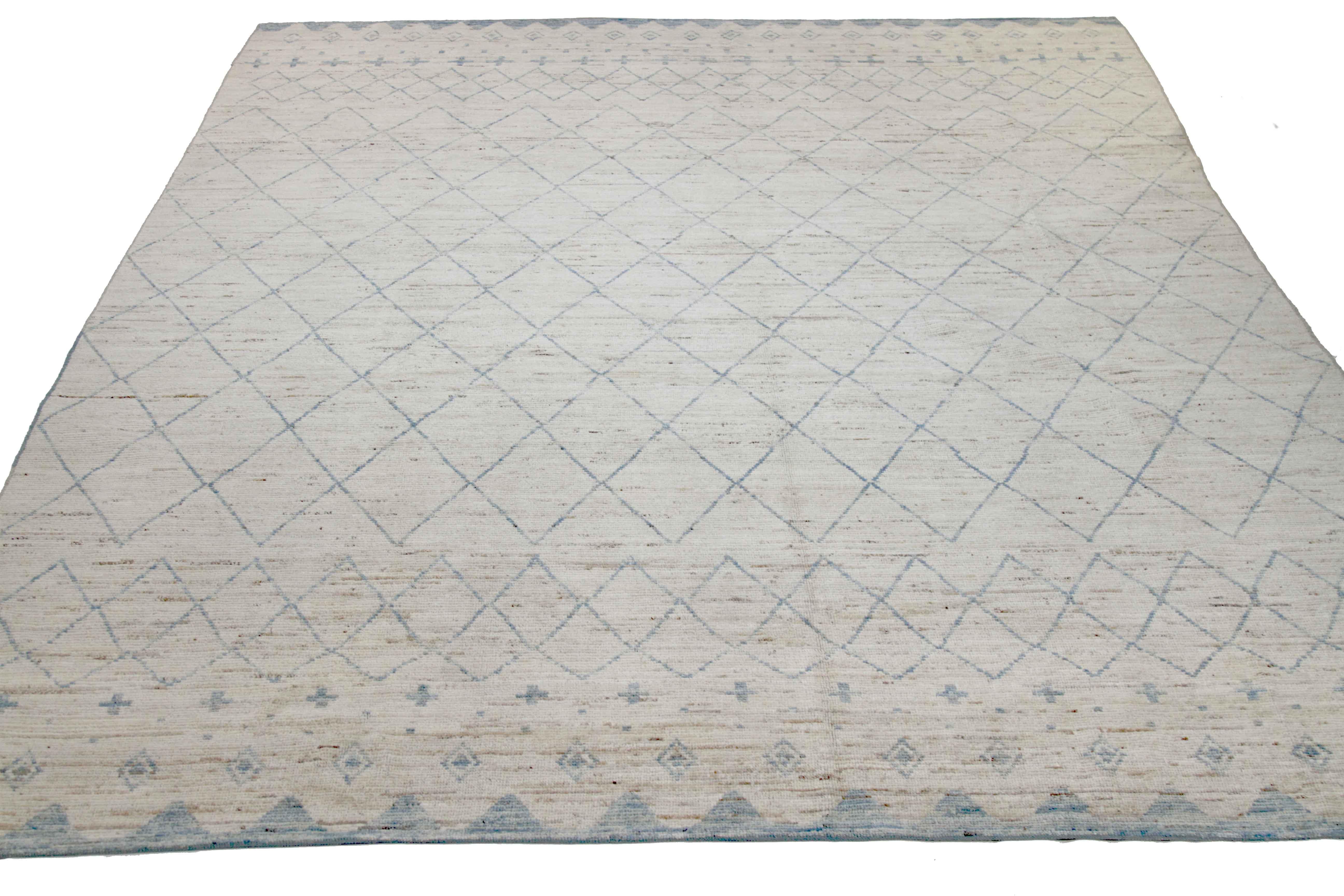 Modern Afghan rug handwoven from the finest sheep’s wool. It’s colored with all-natural vegetable dyes that are safe for humans and pets. This piece is a traditional Afghan weaving featuring a Moroccan inspired design. It’s highlighted by blue