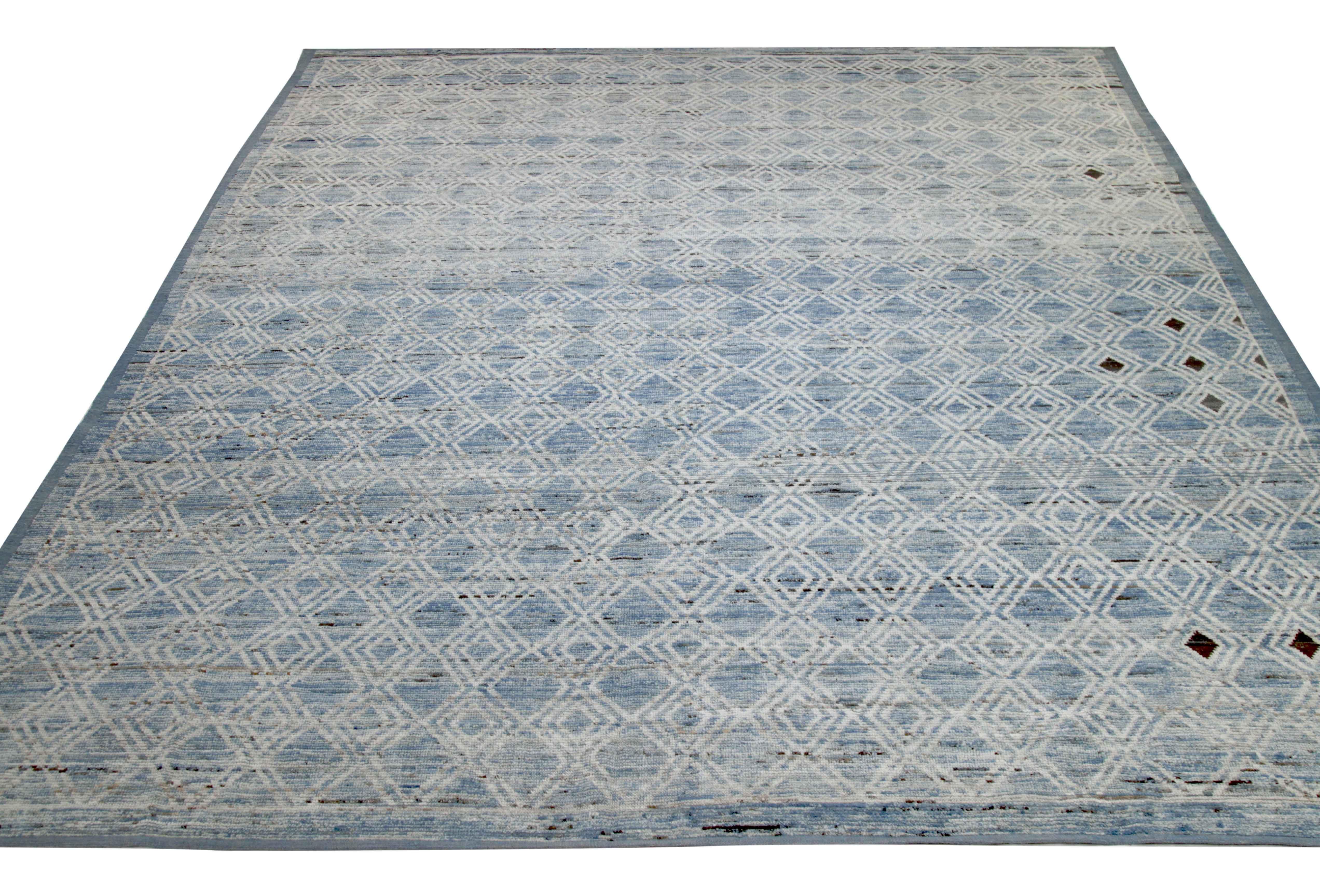 Modern Afghan rug handwoven from the finest sheep’s wool. It’s colored with all-natural vegetable dyes that are safe for humans and pets. This piece is a traditional Afghan weaving featuring a Moroccan inspired design. It’s highlighted by white and