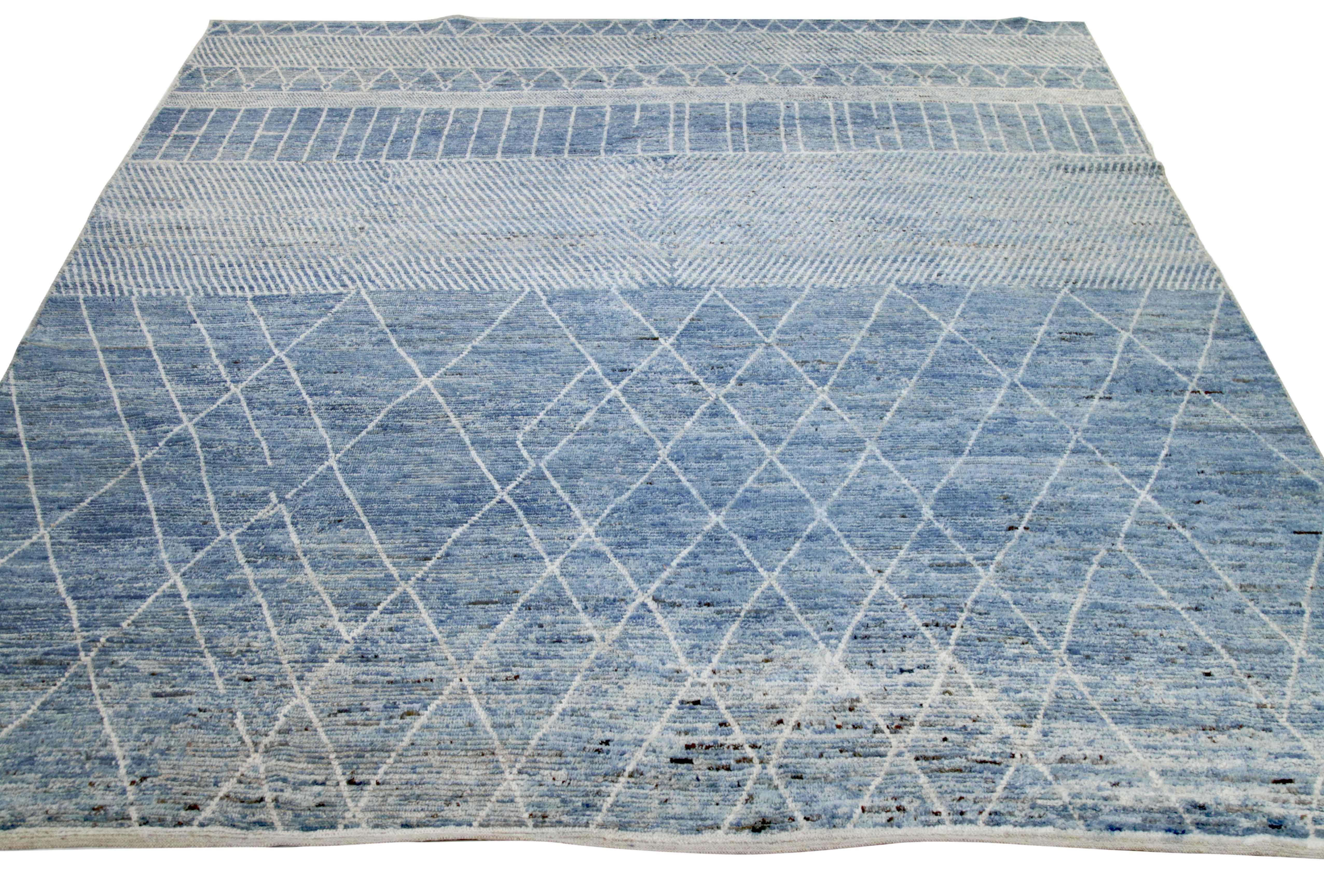 Modern Afghan rug handwoven from the finest sheep’s wool. It’s colored with all-natural vegetable dyes that are safe for humans and pets. This piece is a traditional Afghan weaving featuring a Moroccan inspired design. It’s highlighted by white