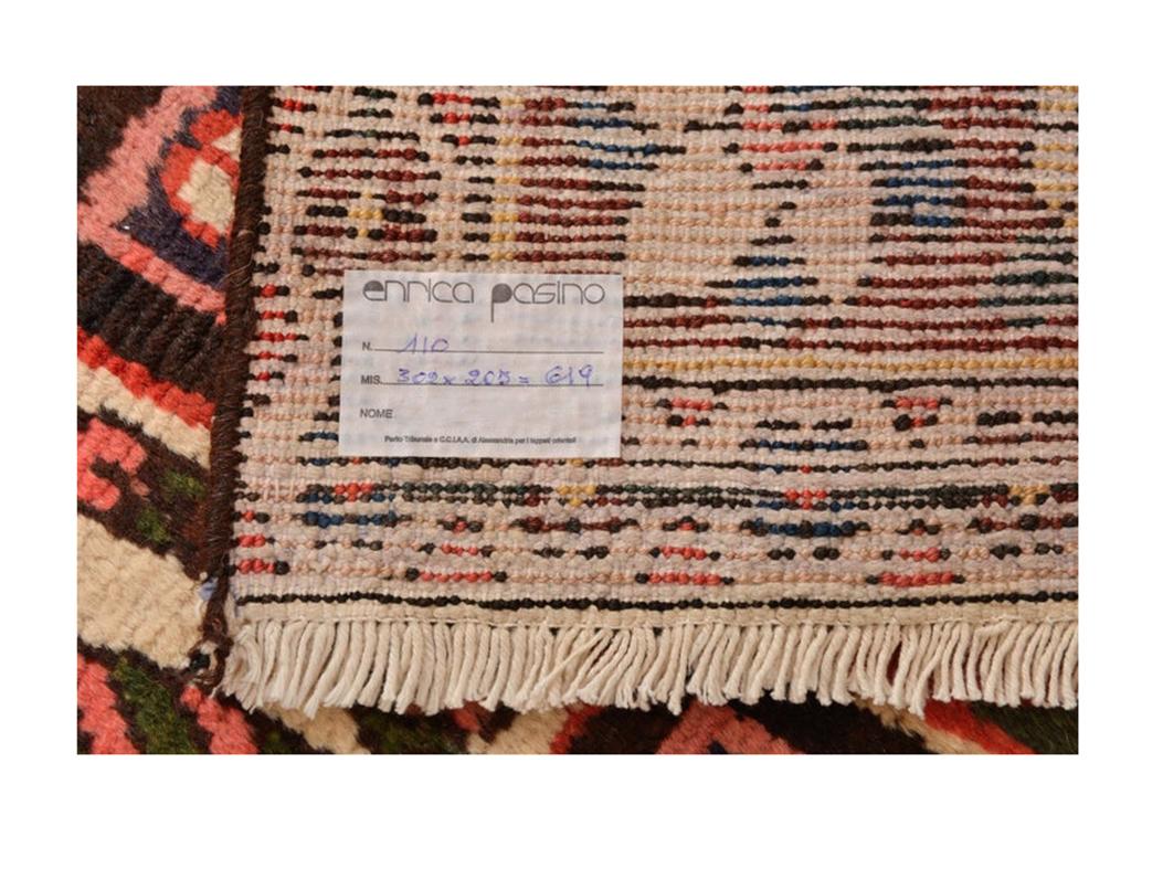 Old carpet, knotted by women under the tents of nomads in Afghanistan. The mosaic design is very popular in the west, also because it's very well setting everywhere and very sturdy.  This one is  
