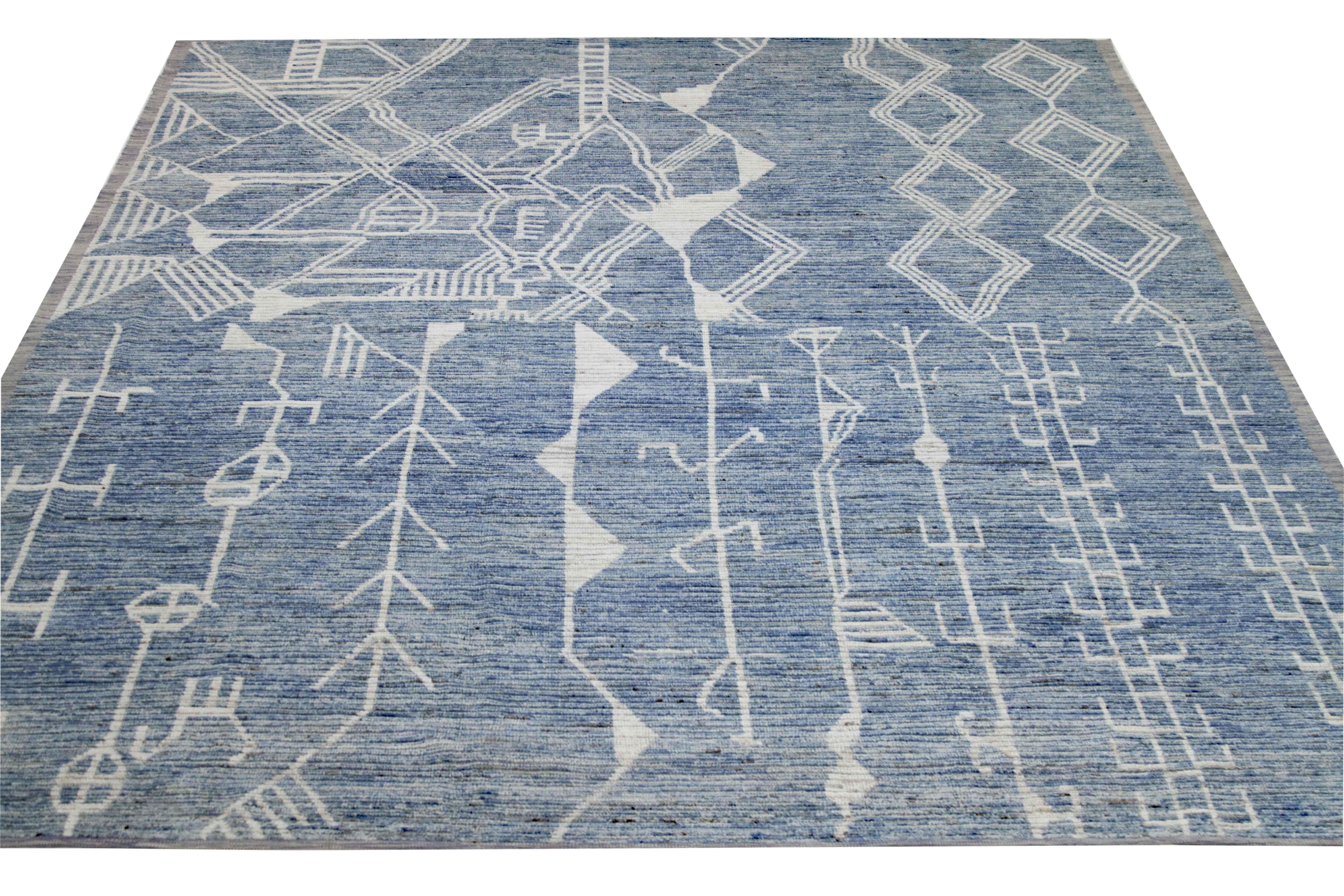 Modern Afghan rug handwoven from the finest sheep’s wool. It’s colored with all-natural vegetable dyes that are safe for humans and pets. This piece is a traditional Afghan weaving featuring a Moroccan inspired design. It’s highlighted by ivory