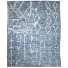 Tapis afghan de conception marocaine avec motifs tribaux ivoires sur fond bleu