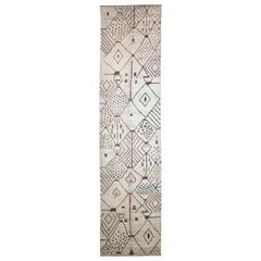 Tapis afghan style marocain avec motifs tribaux bruns et bleus