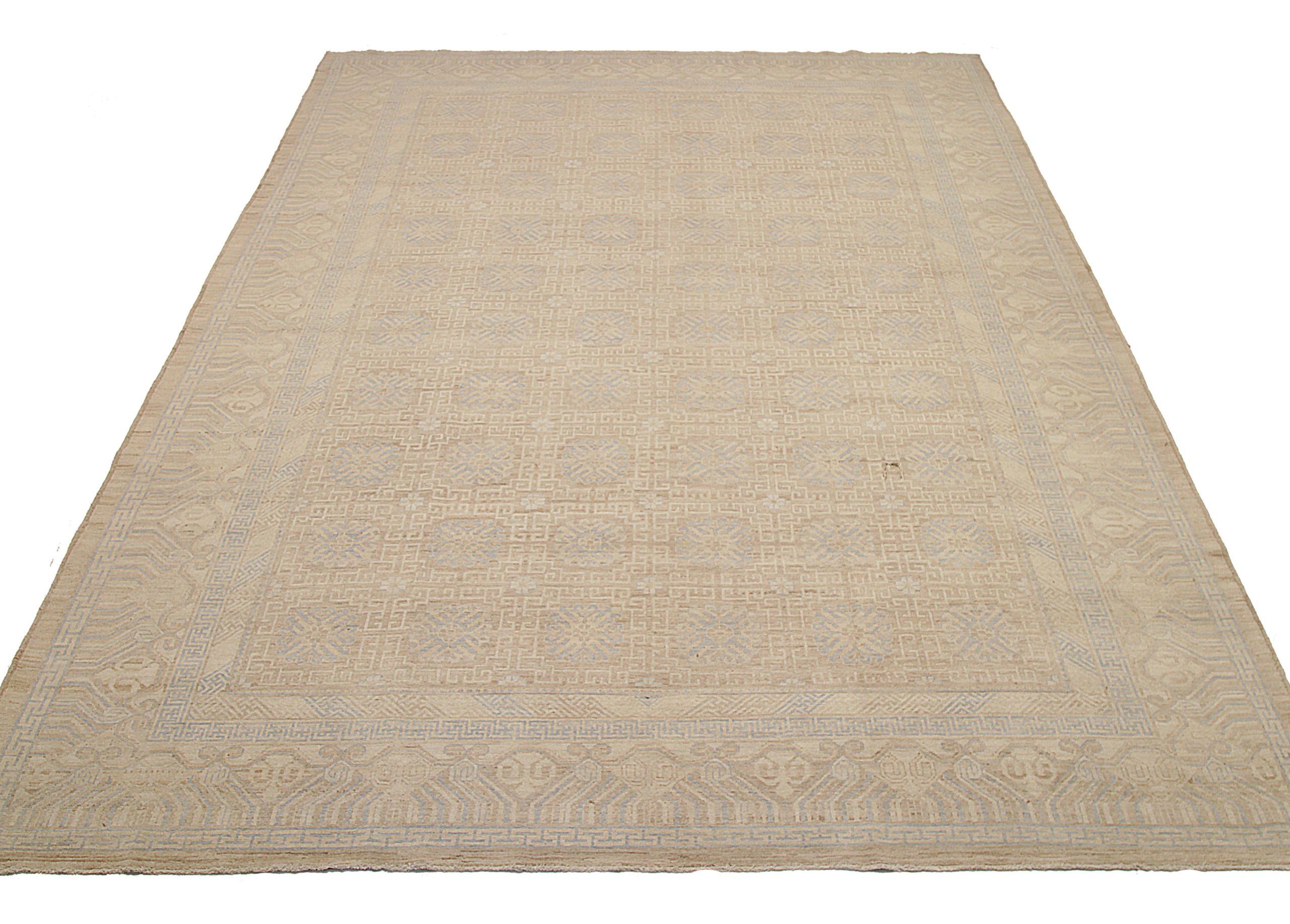 Discover the elegance of Afghanistan Khotan featuring Over Size Rug in Circa 1990. Designed with Wool and BlueIvoryTaupe, this exclusive design is perfect for enhancing your space.
