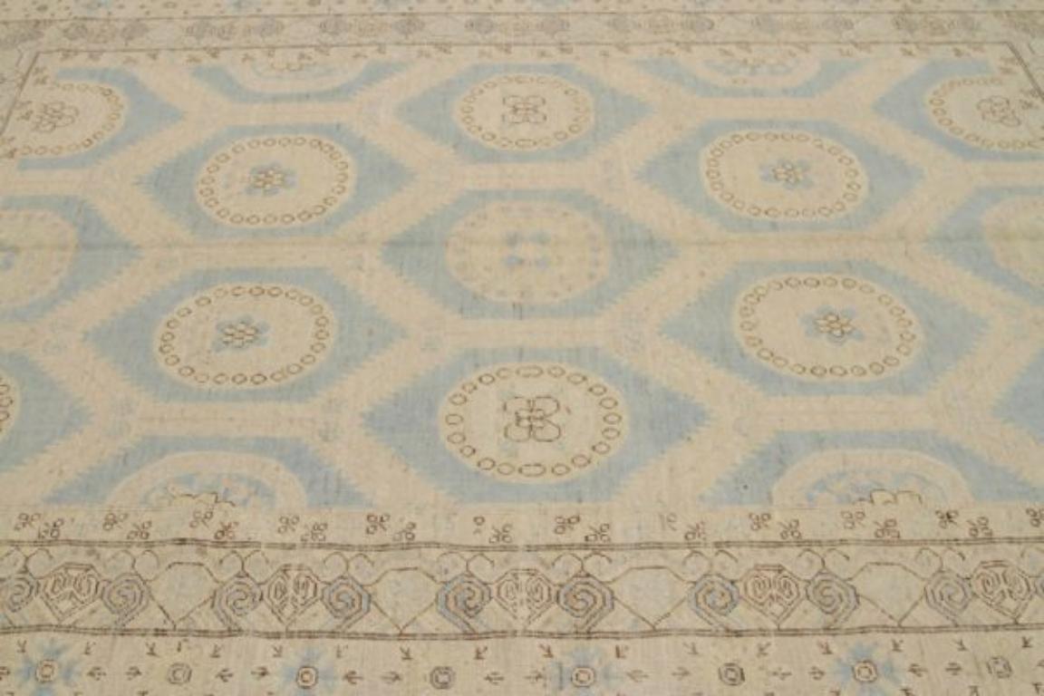 Tribal Petit tapis Khotan en laine bleu ivoire - 92048 en vente