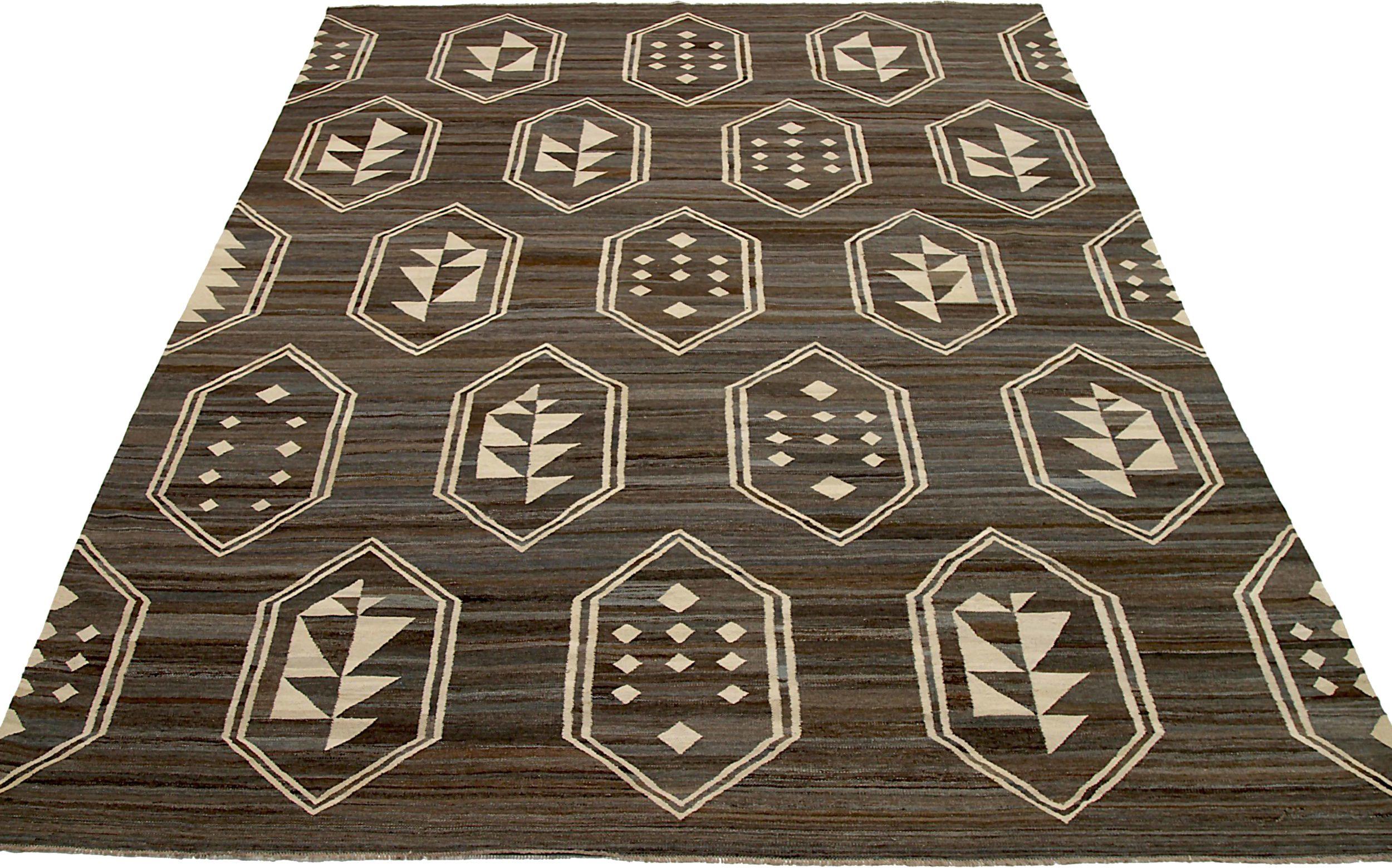 Discover the elegance of Afghanistan Kilim featuring Area Rugs in Circa 1990. Designed with Wool and BrownIvory, this exclusive design is perfect for enhancing your space.