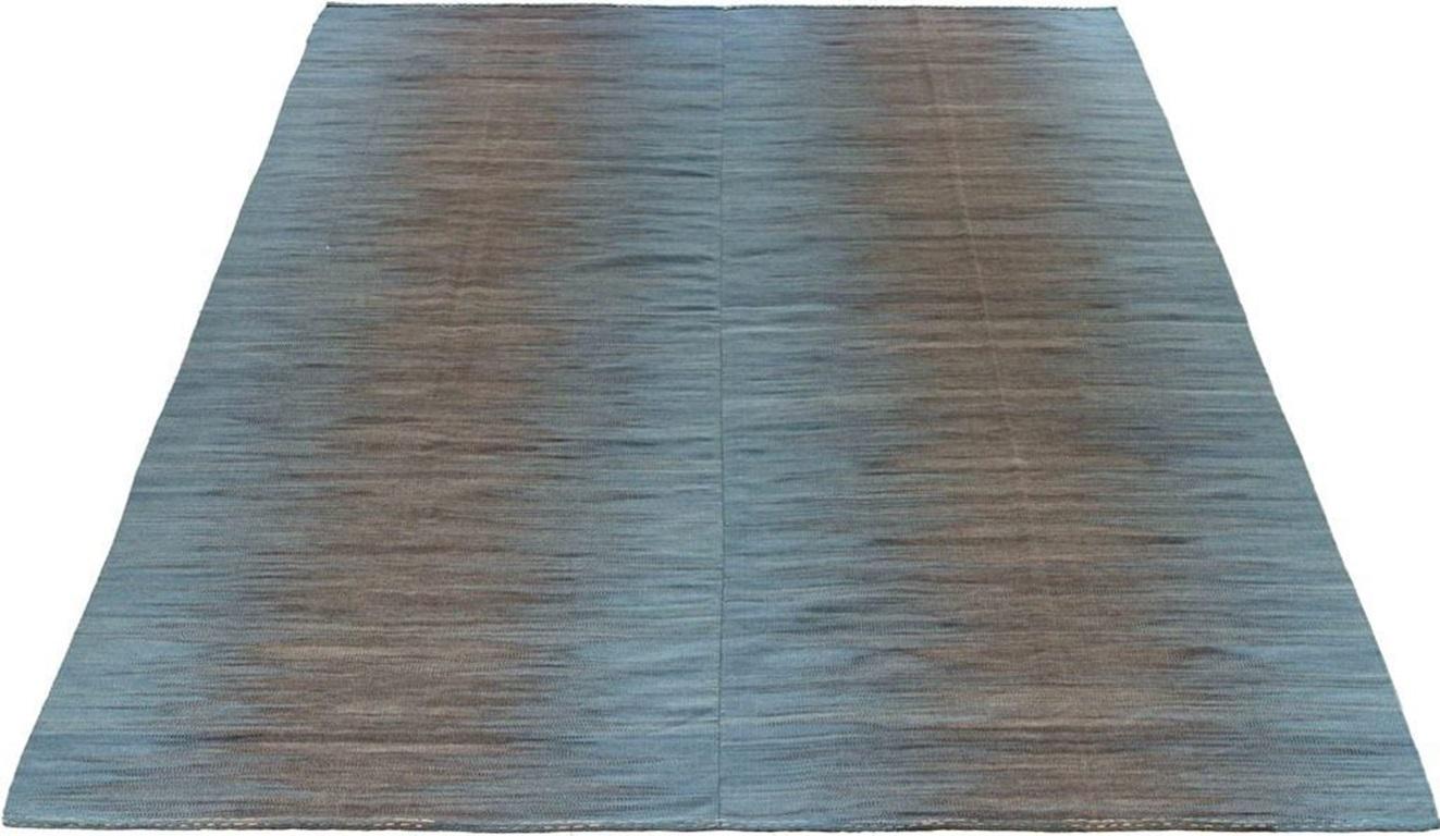 Discover the elegance of Afghanistan Kilim featuring Area Rugs in Circa 1990. Designed with Wool and BlueBrown, this exclusive design is perfect for enhancing your space.