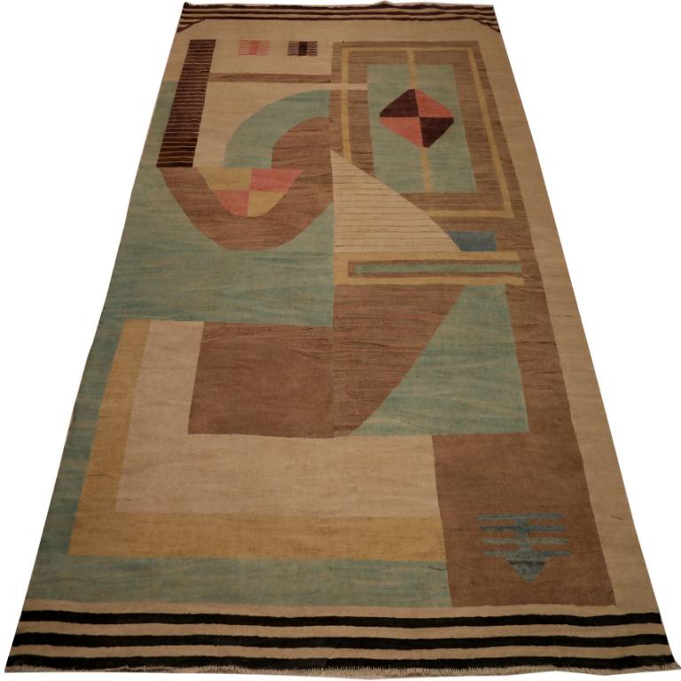 Entdecken Sie die Eleganz der afghanischen Kilims mit Teppichen aus der Zeit um 1990. Dieses exklusive Design aus Wolle und BlauGrünElfenbeinPinkGelb ist perfekt, um Ihren Raum zu verschönern.