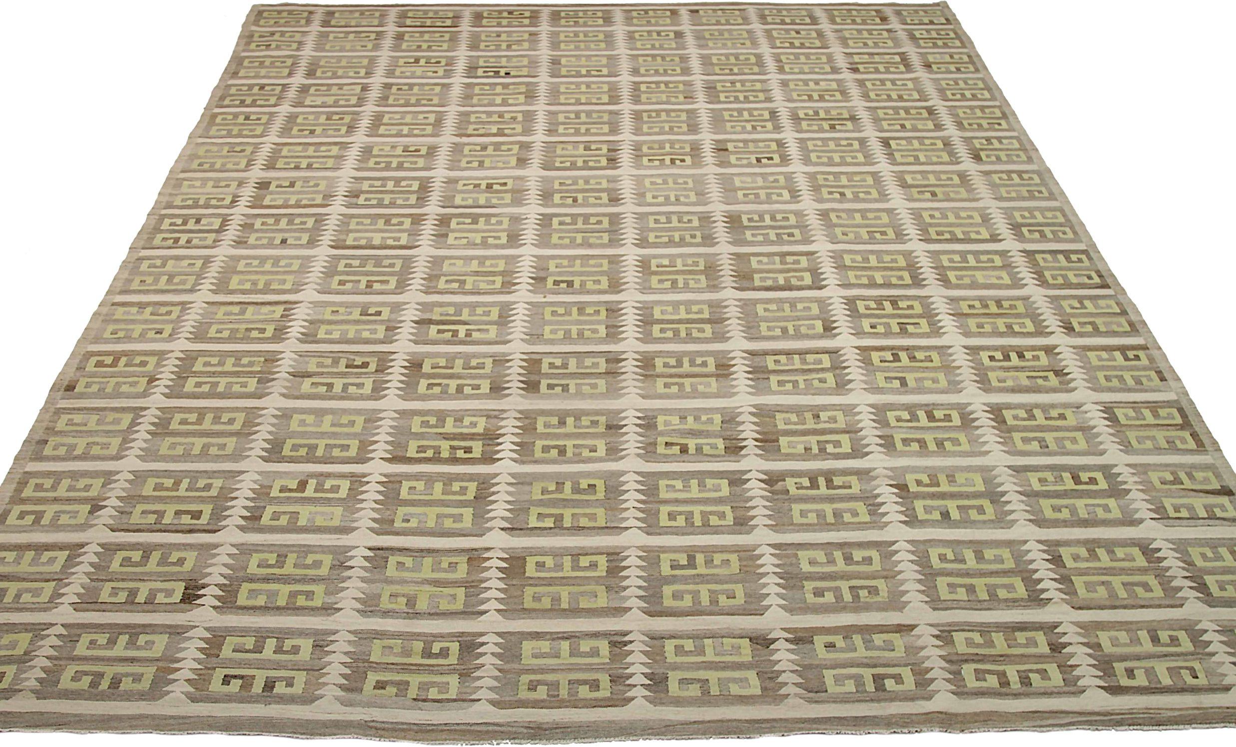 Discover the elegance of Afghanistan Kilim featuring Over Size Rug in Circa 1990. Designed with Wool and BrownIvoryYellow, this exclusive design is perfect for enhancing your space.