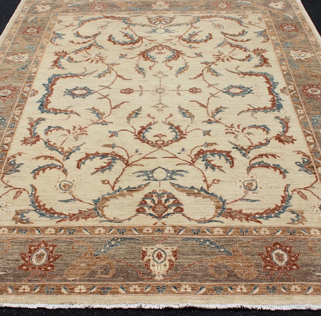 Fine Afghanistan Made Rug in Earthy Tones of Brown, Taupe, Blue, and Coral In Good Condition For Sale In Atlanta, GA