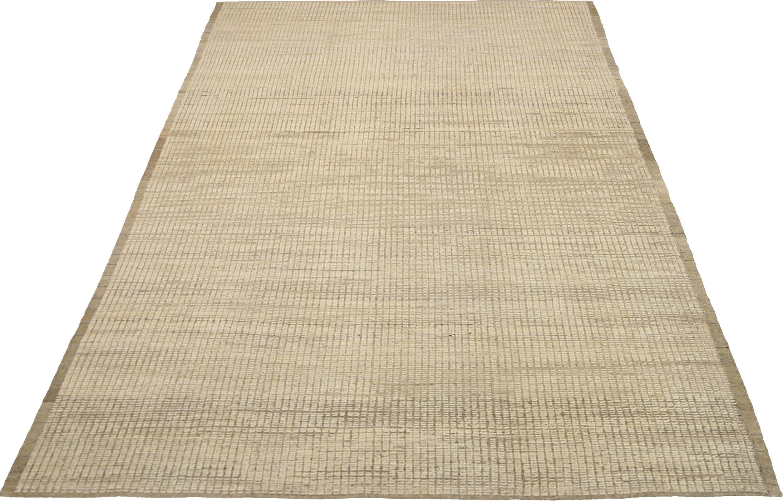 Entdecken Sie die Eleganz der marokkanischen Teppiche aus Afghanistan, die um 1990 entstanden sind. Dieses exklusive Design aus Wolle und Braun-Elfenbein ist perfekt, um Ihren Raum zu verschönern.