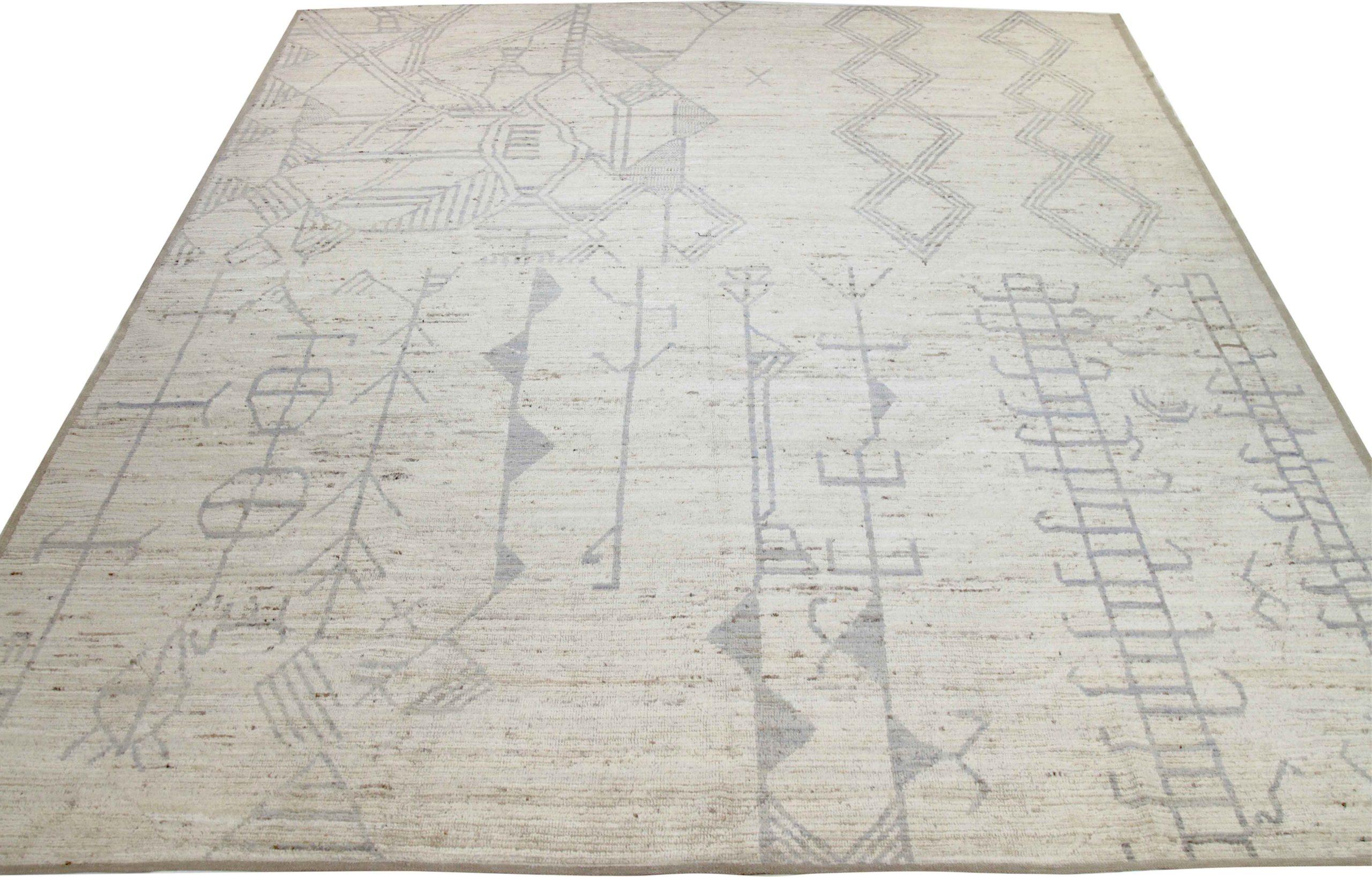 Entdecken Sie die Eleganz der marokkanischen Teppiche aus Afghanistan, die um 1990 entstanden sind. Dieses exklusive Design aus Wolle und Elfenbein ist perfekt, um Ihren Raum zu verschönern.