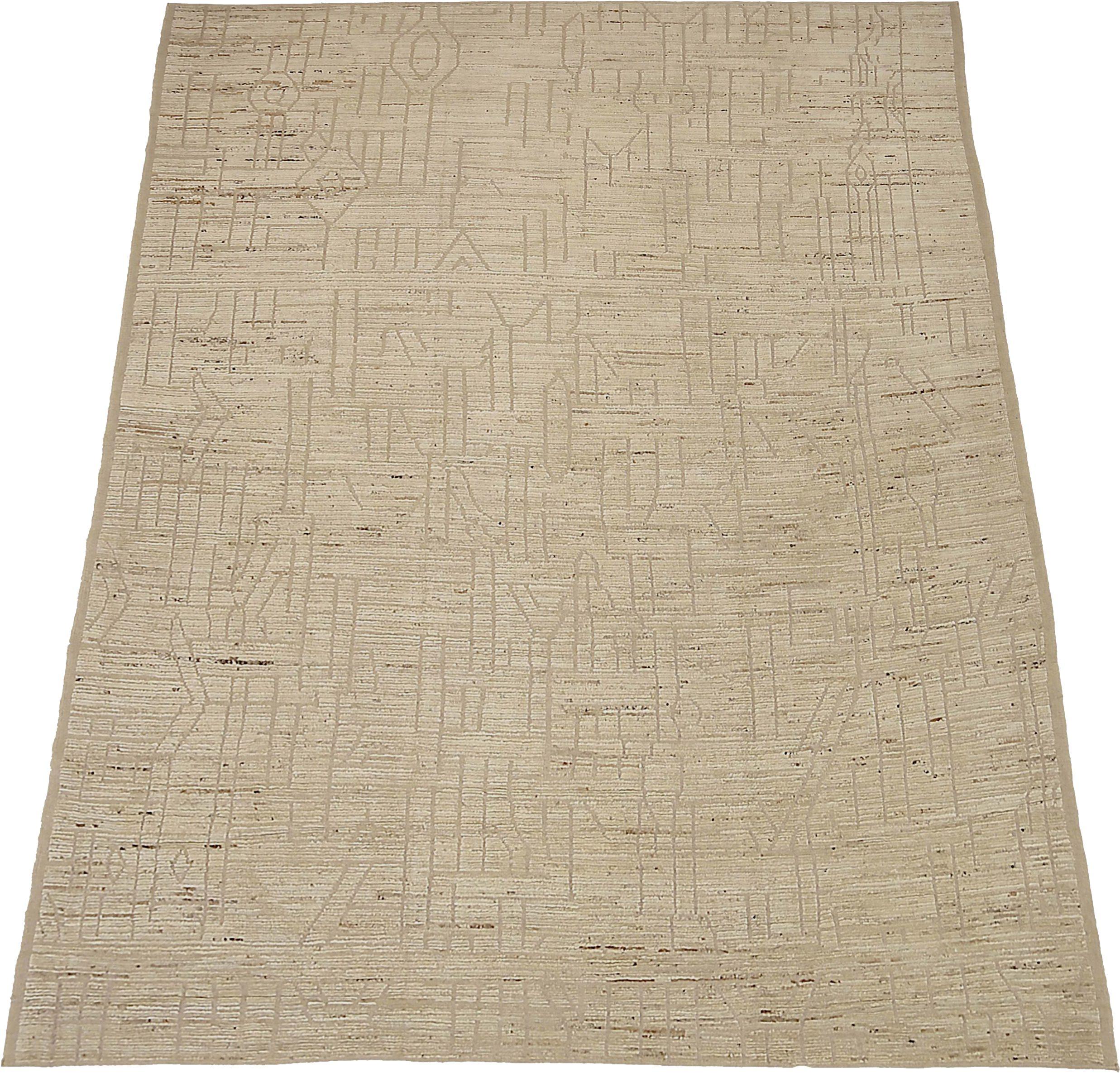 Entdecken Sie die Eleganz der marokkanischen Teppiche aus Afghanistan, die um 1990 entstanden sind. Dieses exklusive Design aus Wolle und IvoryTaupe ist perfekt, um Ihren Raum zu verschönern.
