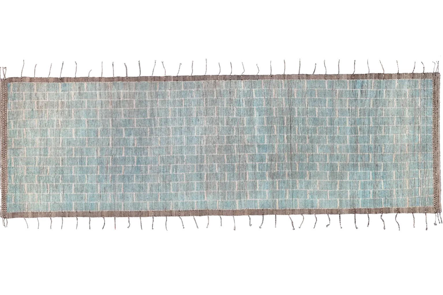 The Moroccan Tribal Runner: A Story Woven in Wool
Discover the exceptional craftsmanship of this Afghan-made runner rug, a masterpiece that beautifully marries Moroccan design with a soulful, modern spirit. More than just a floor covering, this