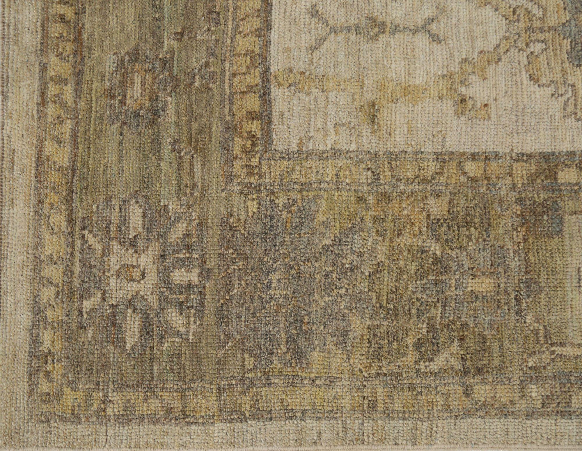 An Elegant and Modern Turkish Oushak Rug
This exquisite area rug is a stunning example of the timeless elegance of the Turkish Oushak design, reimagined for the contemporary home. It is a masterpiece of color and form, where a grand, historic