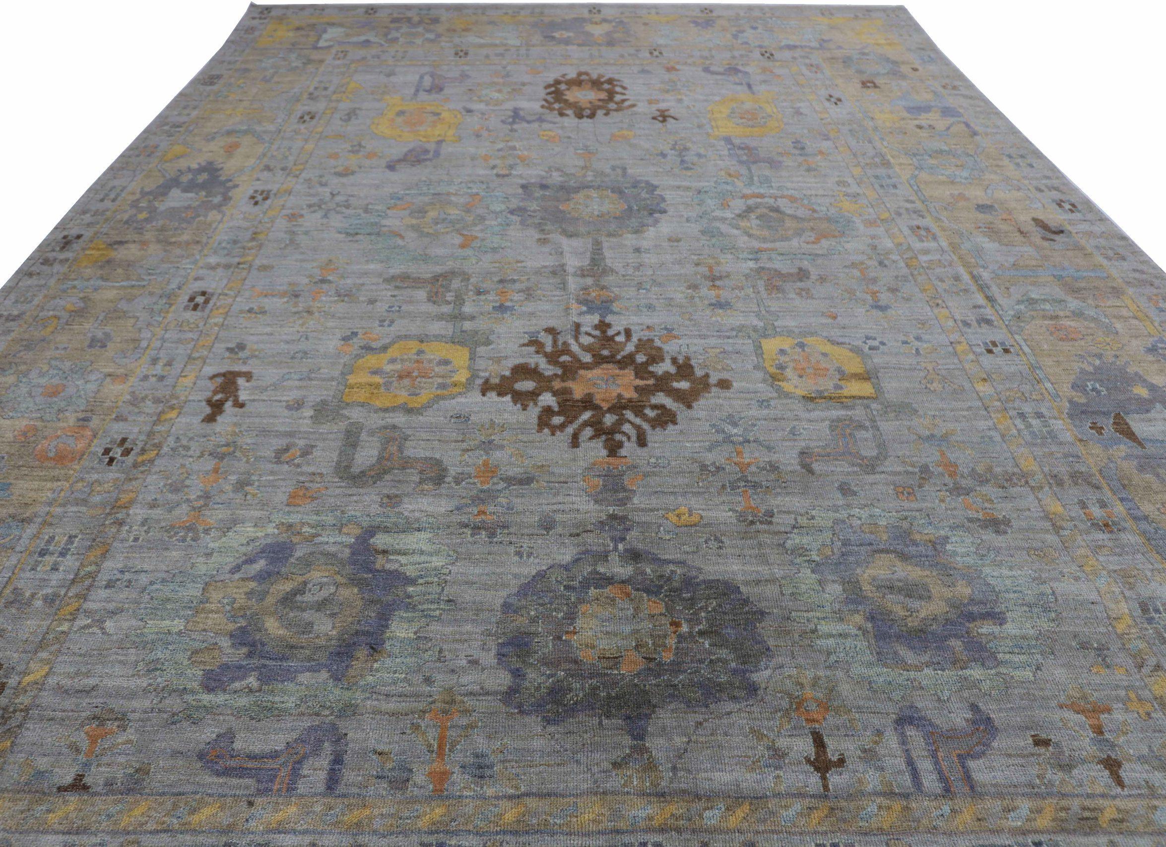 Entdecken Sie die Eleganz von Afghanistan Oushak mit einem übergroßen Teppich von CIRCA 1990. Dieses exklusive Design aus Wolle und BlauBraunPurpelGelb ist perfekt, um Ihren Raum zu verschönern.