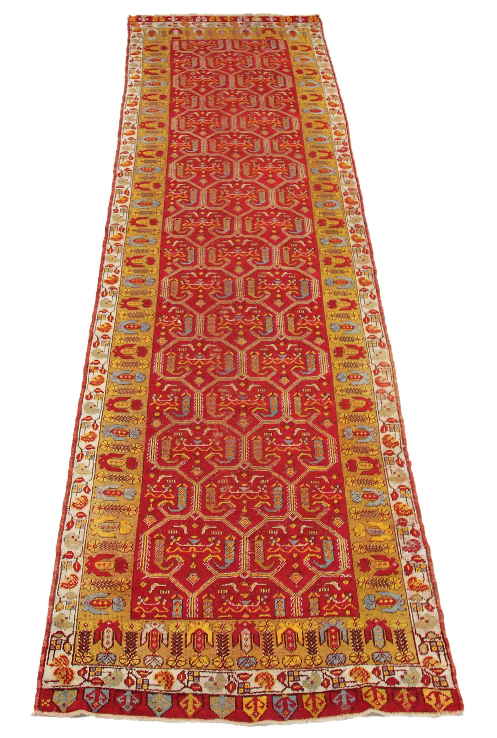 Entdecken Sie die Eleganz von Afghanistan Oushak mit dem Läufer Circa 1940. Dieses exklusive Design aus Wolle und BlauRotGelb ist perfekt, um Ihren Raum zu verschönern.
