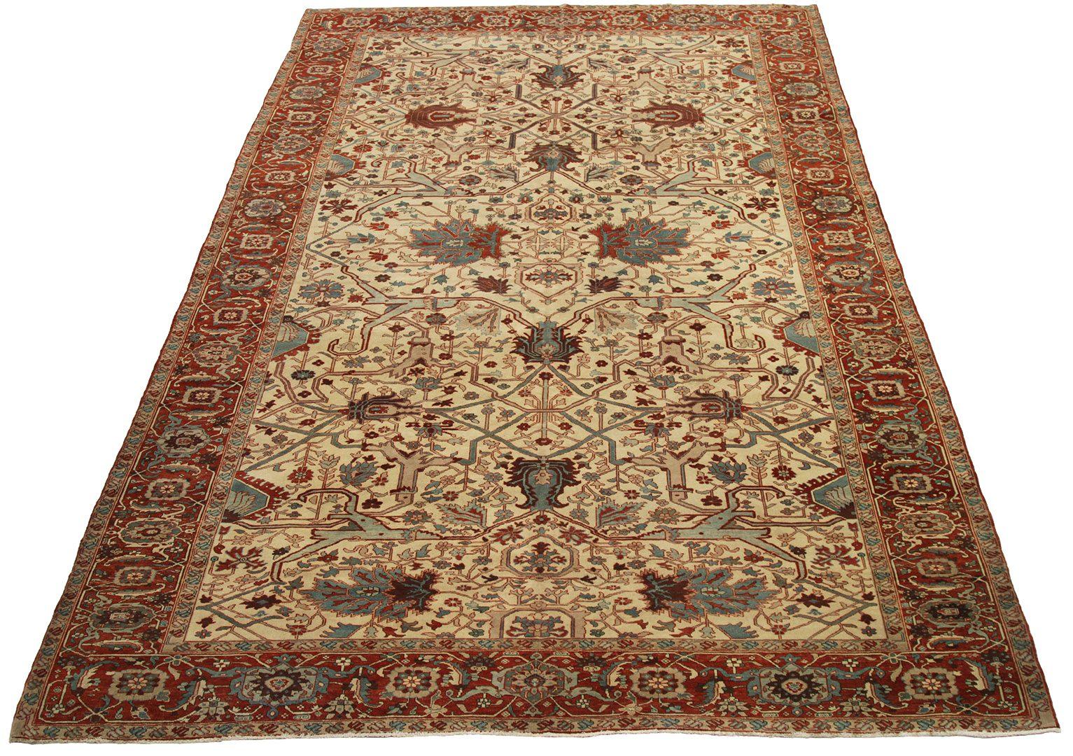 Entdecken Sie die Eleganz von Afghanistan Serapi mit Teppichen von Circa 1990. Dieses exklusive Design aus Wolle und Blau-Elfenbein-Rot ist perfekt, um Ihren Raum zu verschönern.