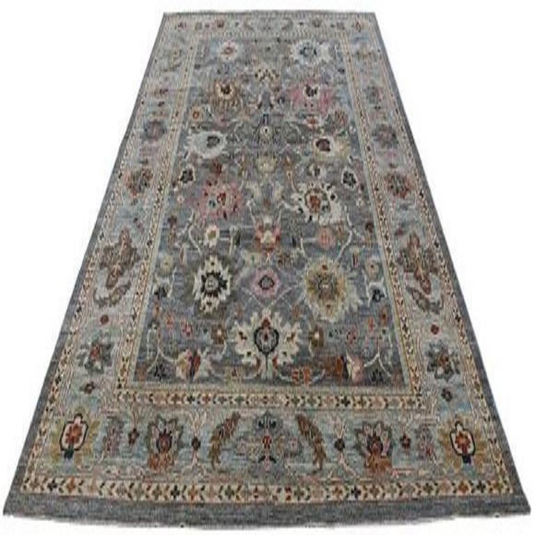 Tribal Turkish Wool Area Rug with Sultanabad Design

This extraordinary rug commands attention with its vibrant, intricate grandeur and a compelling all-over pattern. Its refined palette and meticulous detailing create an unyielding foundation of