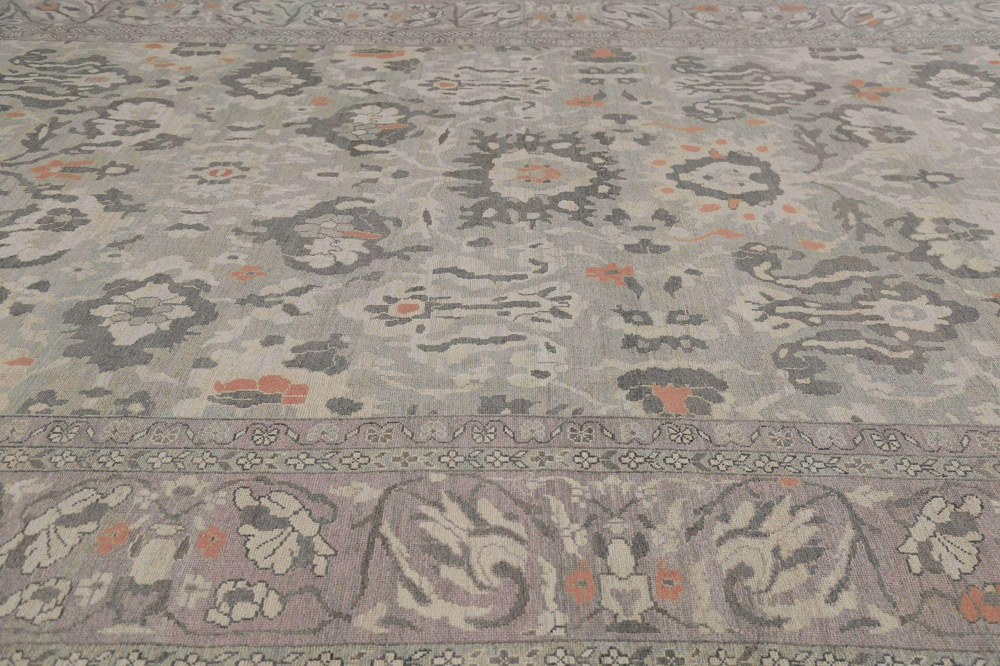 This exquisite Turkish sultanabad rug is a true masterpiece, measuring 12'3'' by 18'6''. Handmade with the utmost care and attention to detail, this rug boasts a stunning color palette of blue, red, and yellow. The intricate design features a