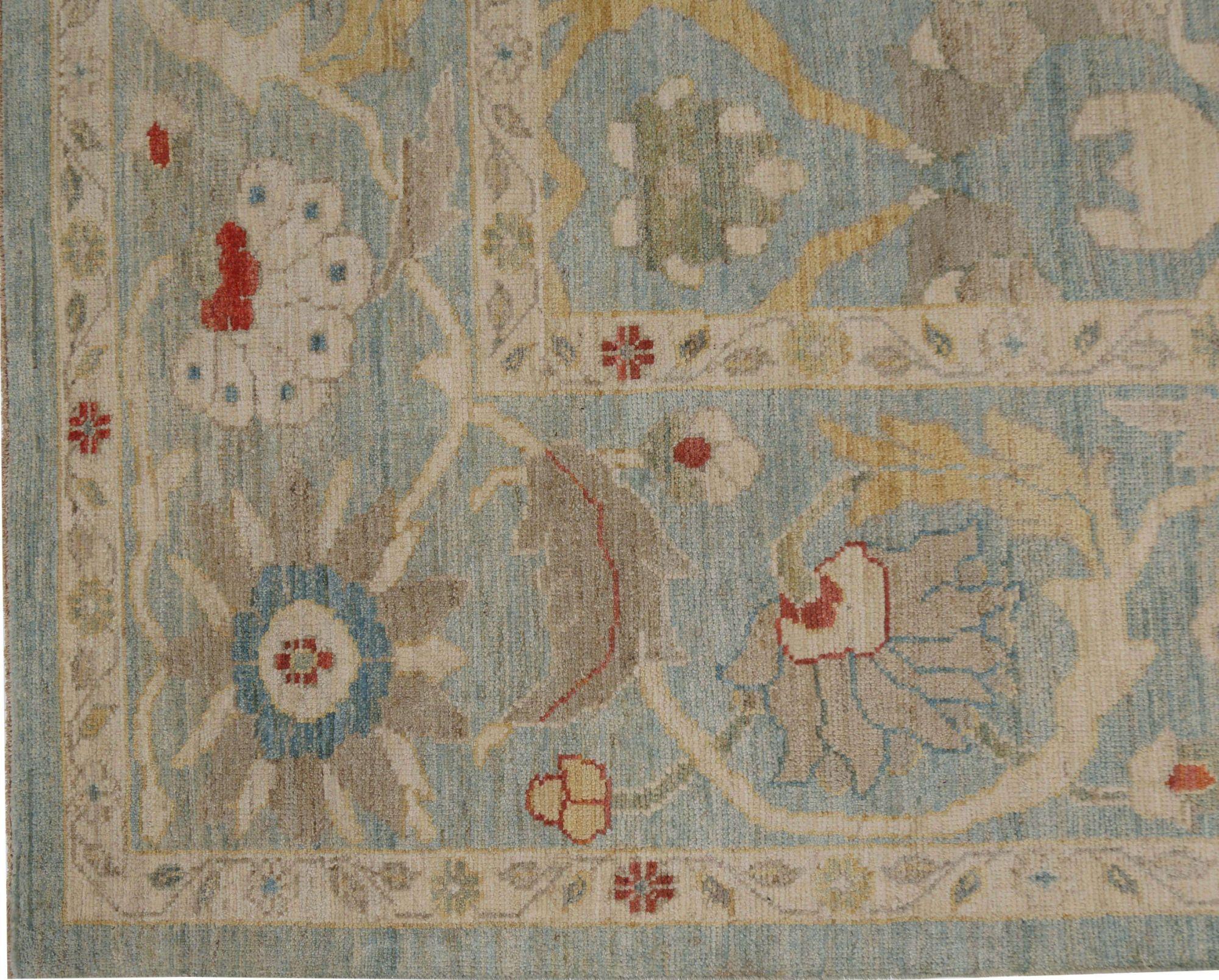 Entdecken Sie die Eleganz des afghanischen Sultanabad-Teppichs in Übergröße aus der Zeit um 1990. Dieses exklusive Design aus Wolle und Hellblau ist perfekt, um Ihren Raum zu verschönern.