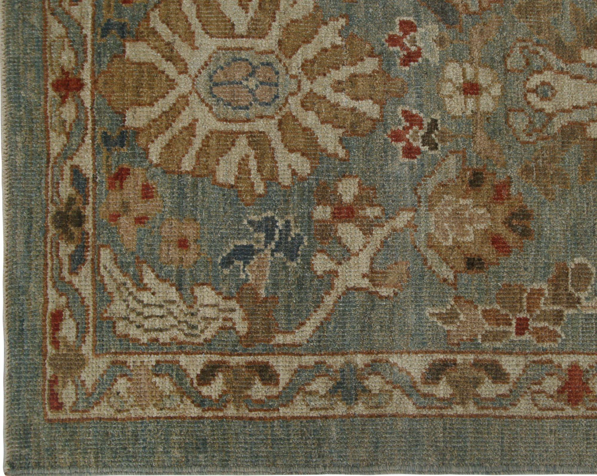 Timeless Journey: A Blue-Green Sultanabad Afghan Runner Rug

Unveiling an Exquisite Afghan Sultanabad Runner Rug
Grace your passages with this magnificent hand-knotted Sultanabad Runner Rug from Afghanistan. Its tranquil palette and classic design