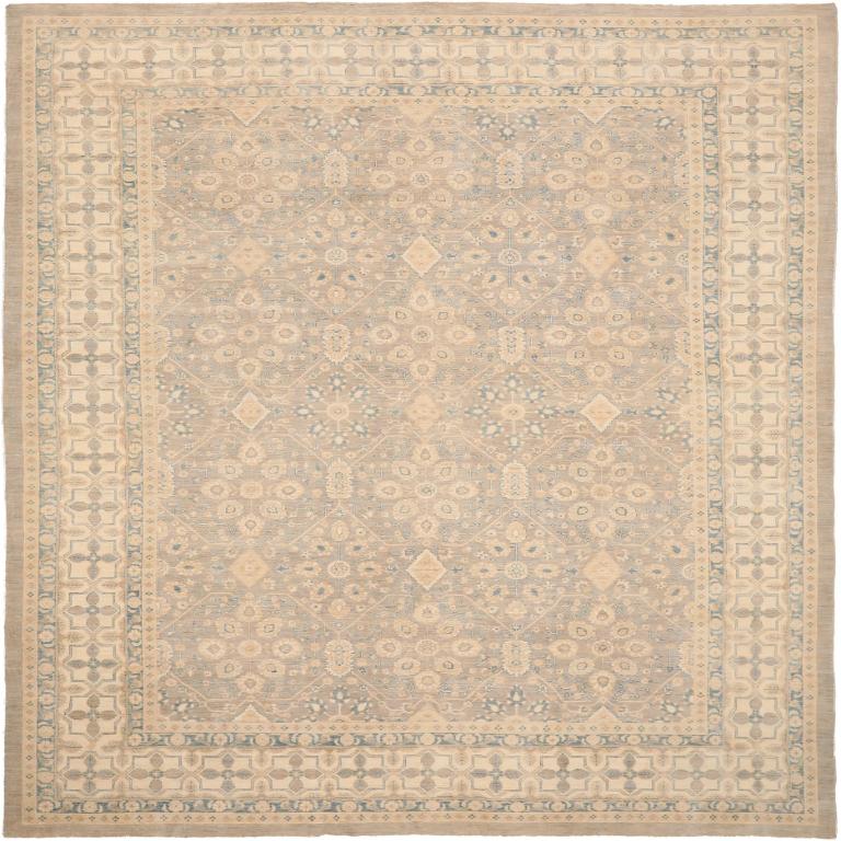 Scopri l'eleganza dell'Afghanistan Tabriz con i tappeti d'area CIRCA 1990. Progettato con lana e giallo avorio, questo design esclusivo è perfetto per valorizzare il tuo spazio.