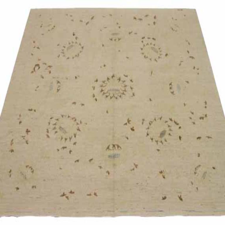  Tribal Afghan Wool Square Area Rug

This extraordinary rug commands attention with its intricate geometric grandeur and a compelling all-over pattern. Its robust construction and profound, antique palette provide an unyielding foundation of