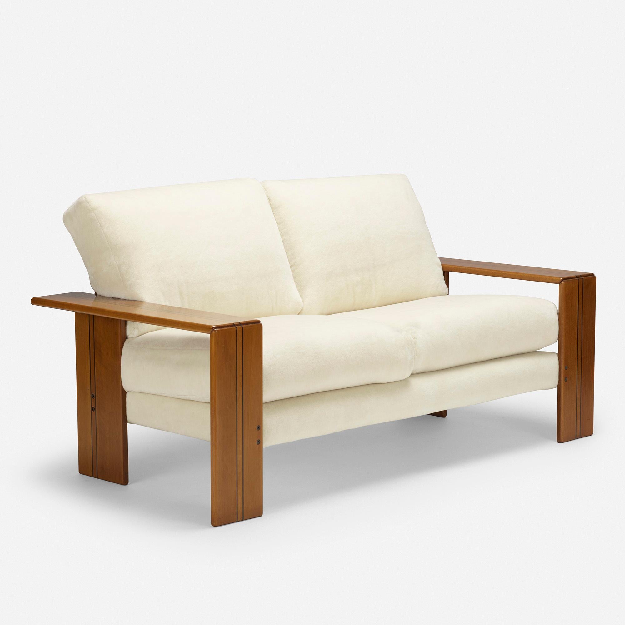 Afra and Tobia Scarpa Artona settee by Maxalto

Made by Maxalto, Italy, 1975

Additional information:
Material: Walnut, mohair, ebony
Size: 66 W × 33.5 D × 33 H inches

Condition: Upholstery was updated as needed. Seat cushions each show a