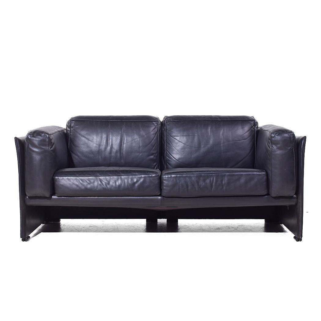 Afra and Tobia Scarpa for Cassina Mid Century Italian Leather Sofa

This sofa measures: 64 wide x 32.5 deep x 27 inches high, with a seat height of 16 and arm height of 24.5 inches

We take our photos in a controlled lighting studio to show as much