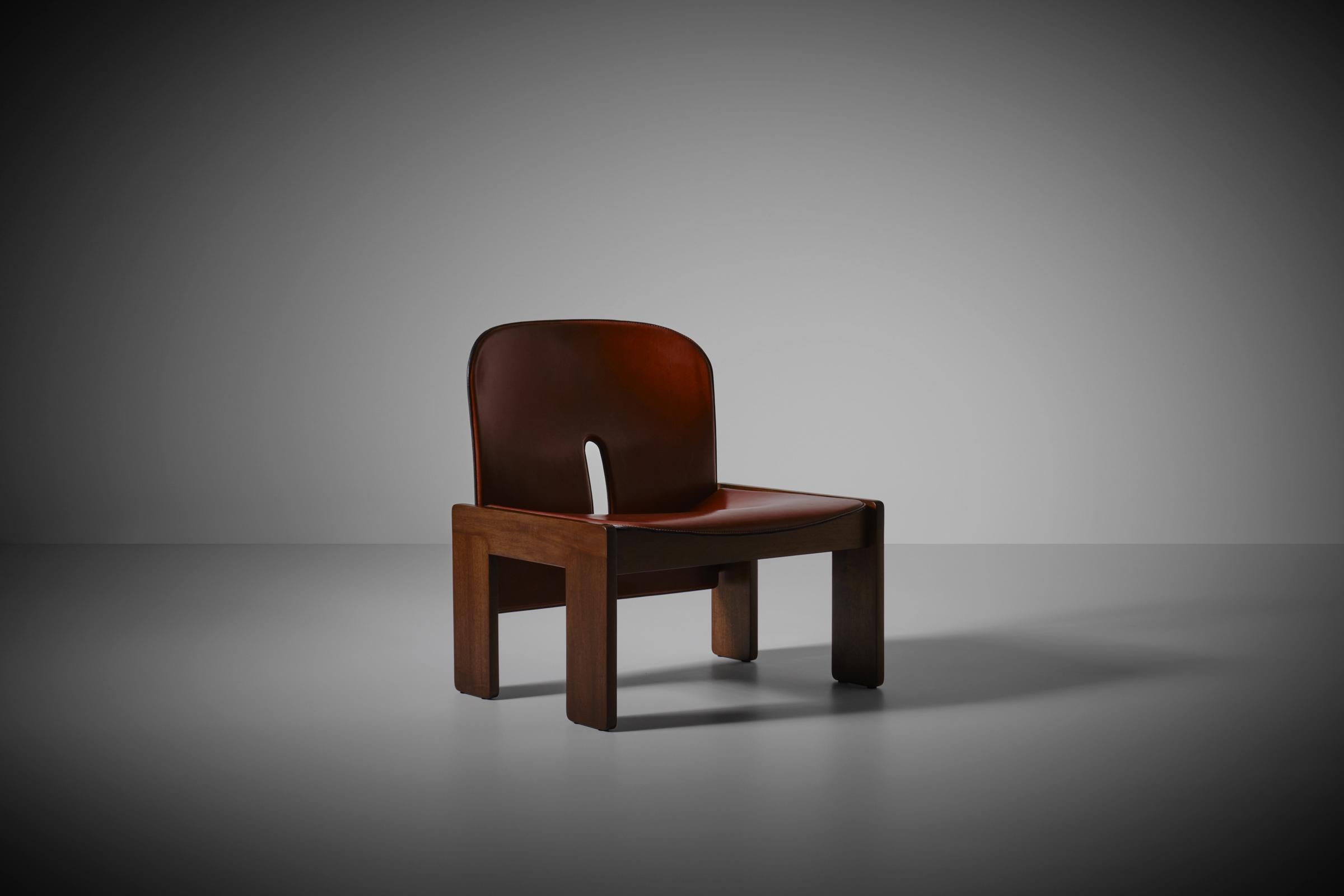 Afra & Tobia Scarpa mod. '925’ easy chair for Cassina, Italy 1966. Beautiful example made out of nice dark warm colored walnut and ox blood red leather. The chair is inspired by a sketch made in 1943 by the famous father of Tobia, architect Carlo