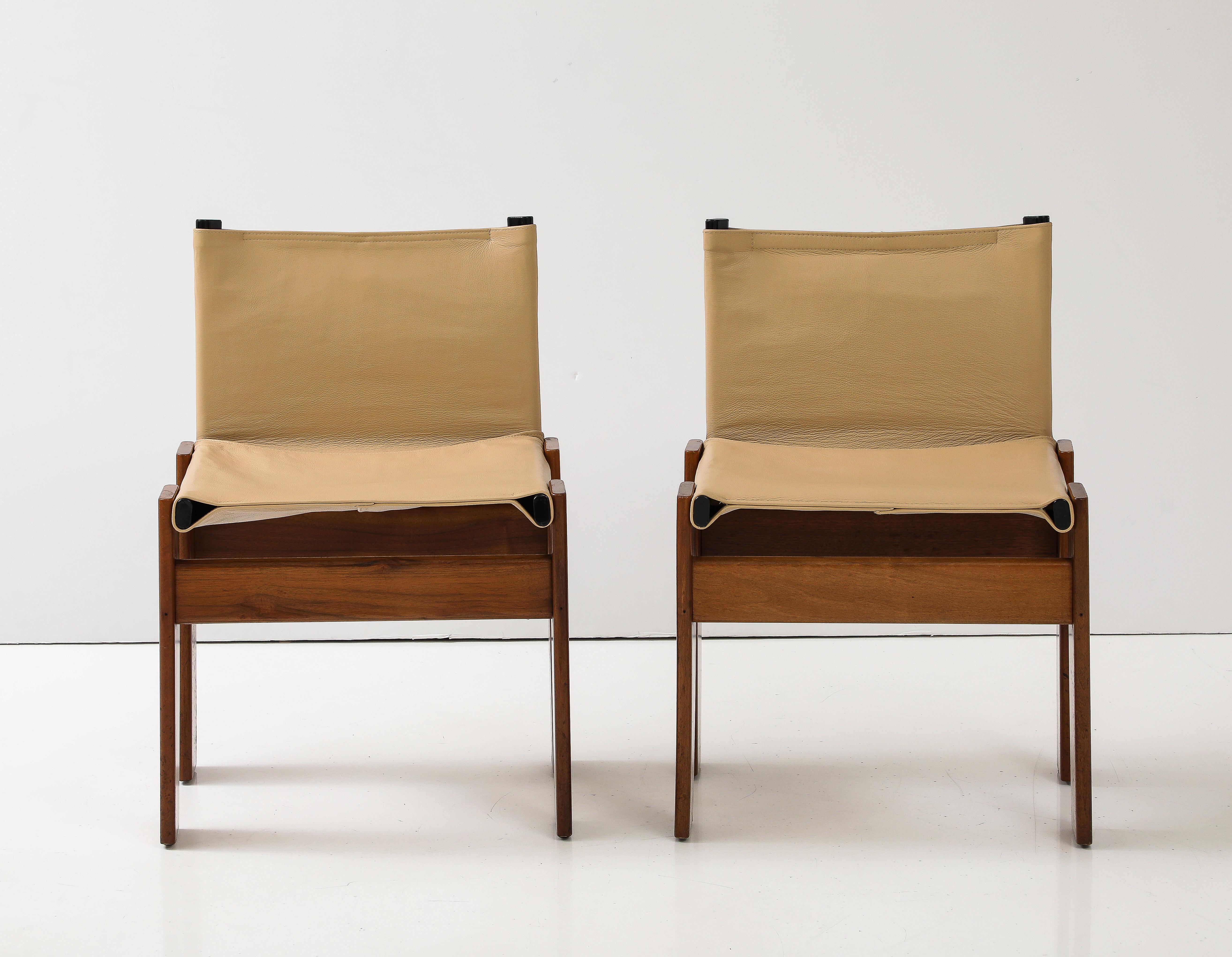 Afra and Tobia Scarpa Pair of 'Monk' Chairs for Molteni, Italy, circa 1974 

A simplified and solid design by Italian award-winning designer couple Afra & Tobia Scarpa, the 'Monk' model is composed of two equal trestles in solid wood attached to