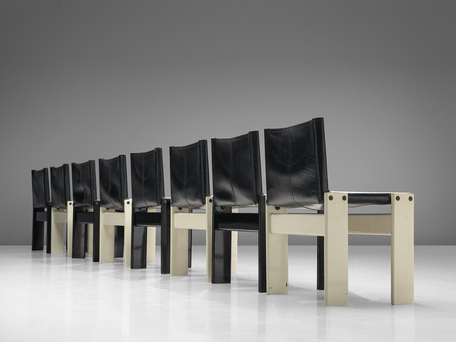 Afra & Tobia Scarpa for Molteni, Monk set of 8 dining chairs, black and white lacquered wood and black leather, Italy, 1974.

The wonderfully deep black leather is a wonderful combination with the black and white lacquered wood. Interesting is the