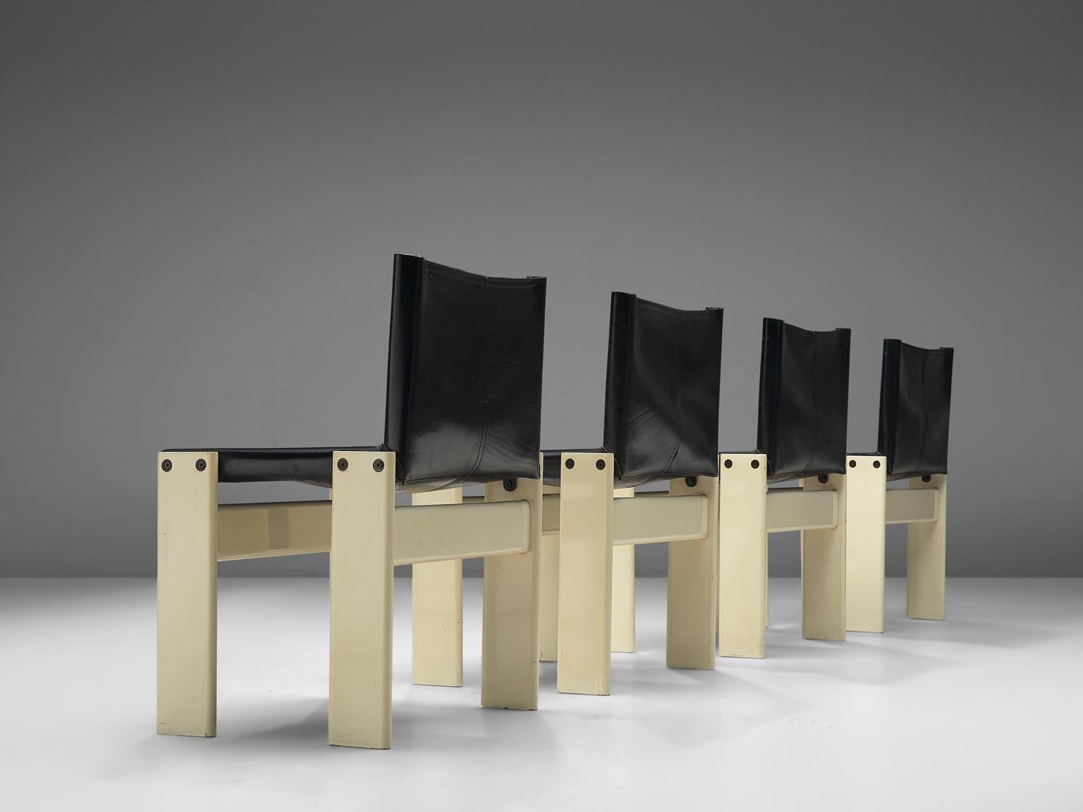Afra & Tobia Scarpa for Molteni, Monk set of four dining chairs, white lacquered wood and black leather, Italy, 1974.

The wonderfully deep black leather is in wonderful contrast with the white lacquered wood. Interesting is the 'flat' shape of