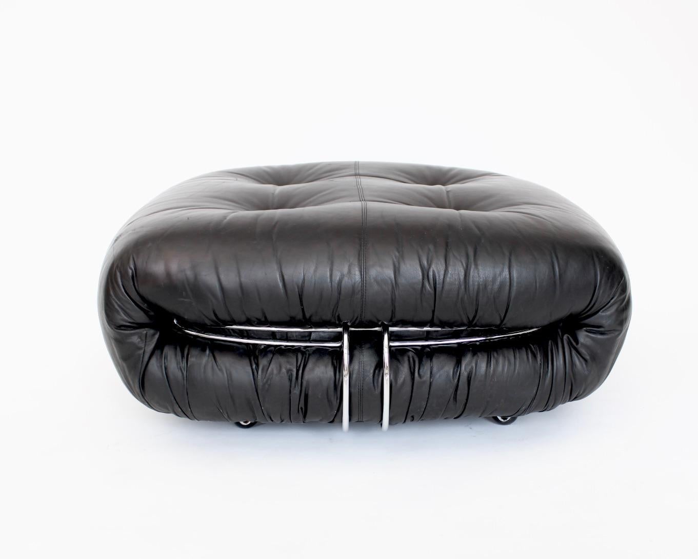 Afra and Toba Scarpa Soriana Cassina Pouf or Ottoman c1970s;  Modern; Italian Original black leather in excellent condition.  The ottoman can be easily moved around since it has castors attached to the underside. The Soriana collection was meant to
