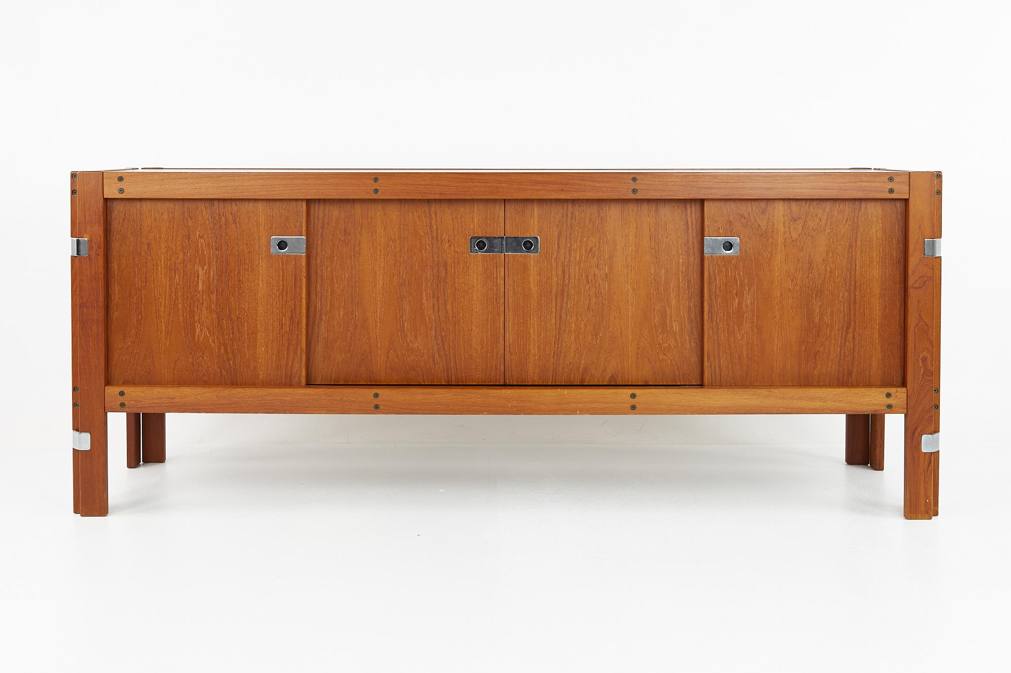 Afra and Tobia Scarpa style mid century teak and chrome sideboard credenza

This credenza measures: 74 wide x 19 deep x 29.5 inches high

All pieces of furniture can be had in what we call restored vintage condition. That means the piece is