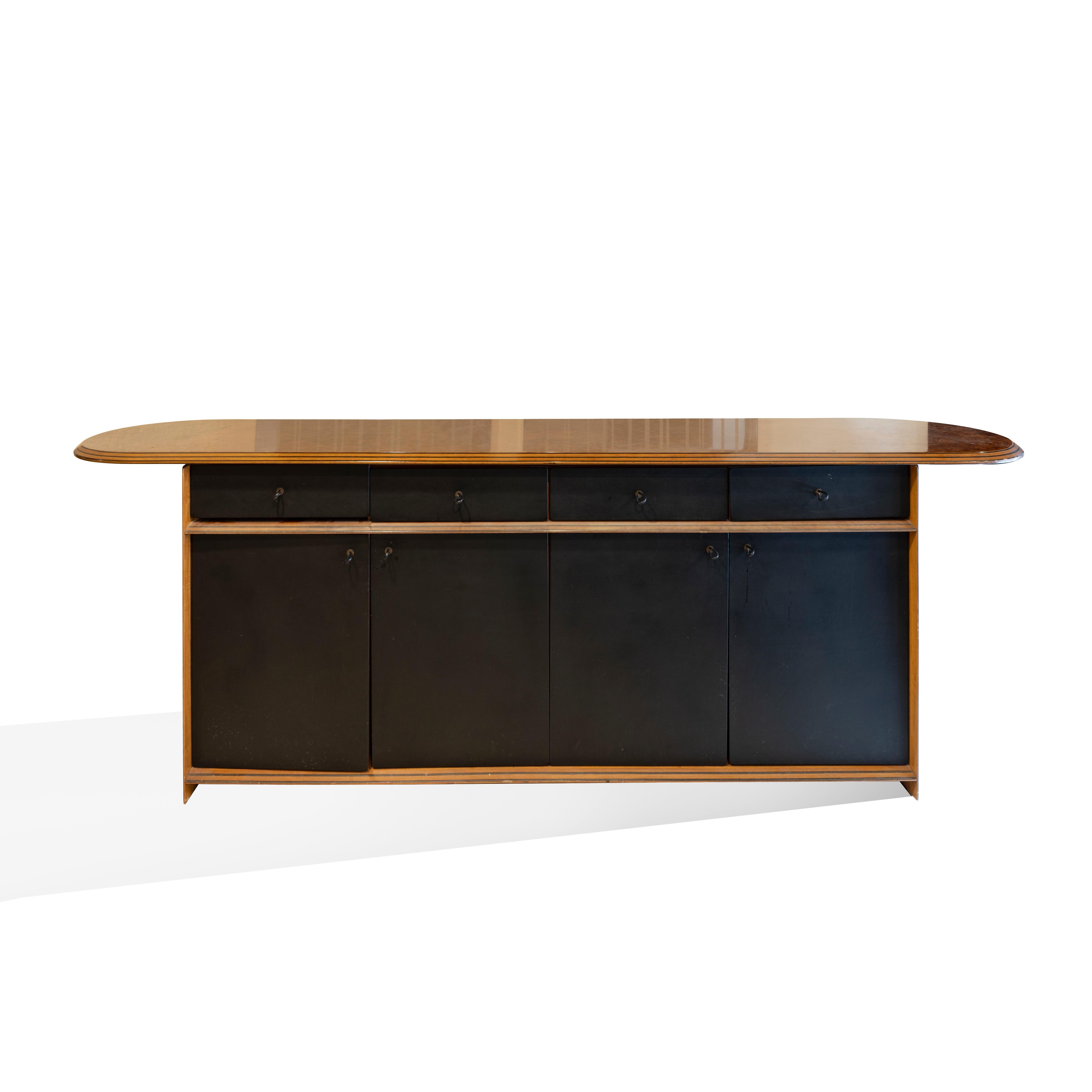Afra e Tobia Scarpa Africa serie Artona Maxalto black leather and special wood sideboard Afra &Tobia Scarpa the duo of architectat and design the beginning of 70s, where the most used material is plastic, go against the tide and invent a new line of