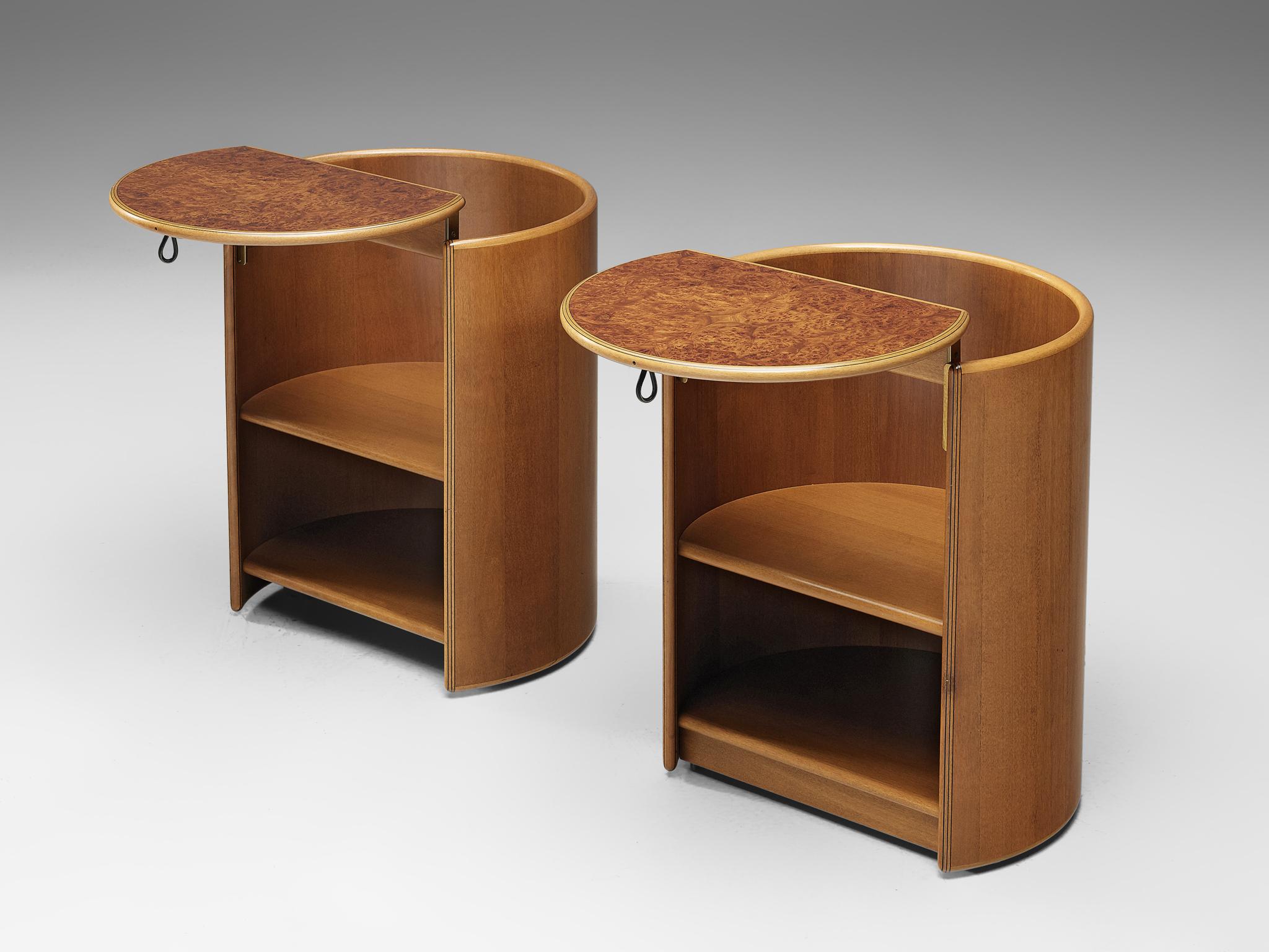 Afra & Tobia Scarpa for Maxalto, pair of side tables, walnut, burl, ebonized wood and brass, Italy, 1975

A pair of night stands by Afra and Tobias Scarpa for Maxalto. The nightstands feature a flip-top to turn the pieces in side tables. The