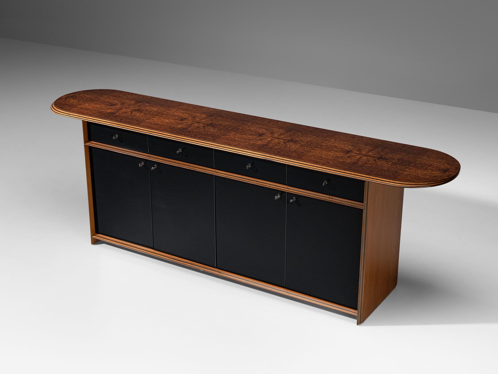 Afra & Tobia Scarpa for Maxalto, sideboard, model 'Artona', walnut, burlwood, lacquered wood, leather, Italy, 1975/1979

Gorgeous sideboard designed by duo Afra and Tobia Scarpa in the 1970s. This sideboard is designed as part of the ‘Artona’ line.