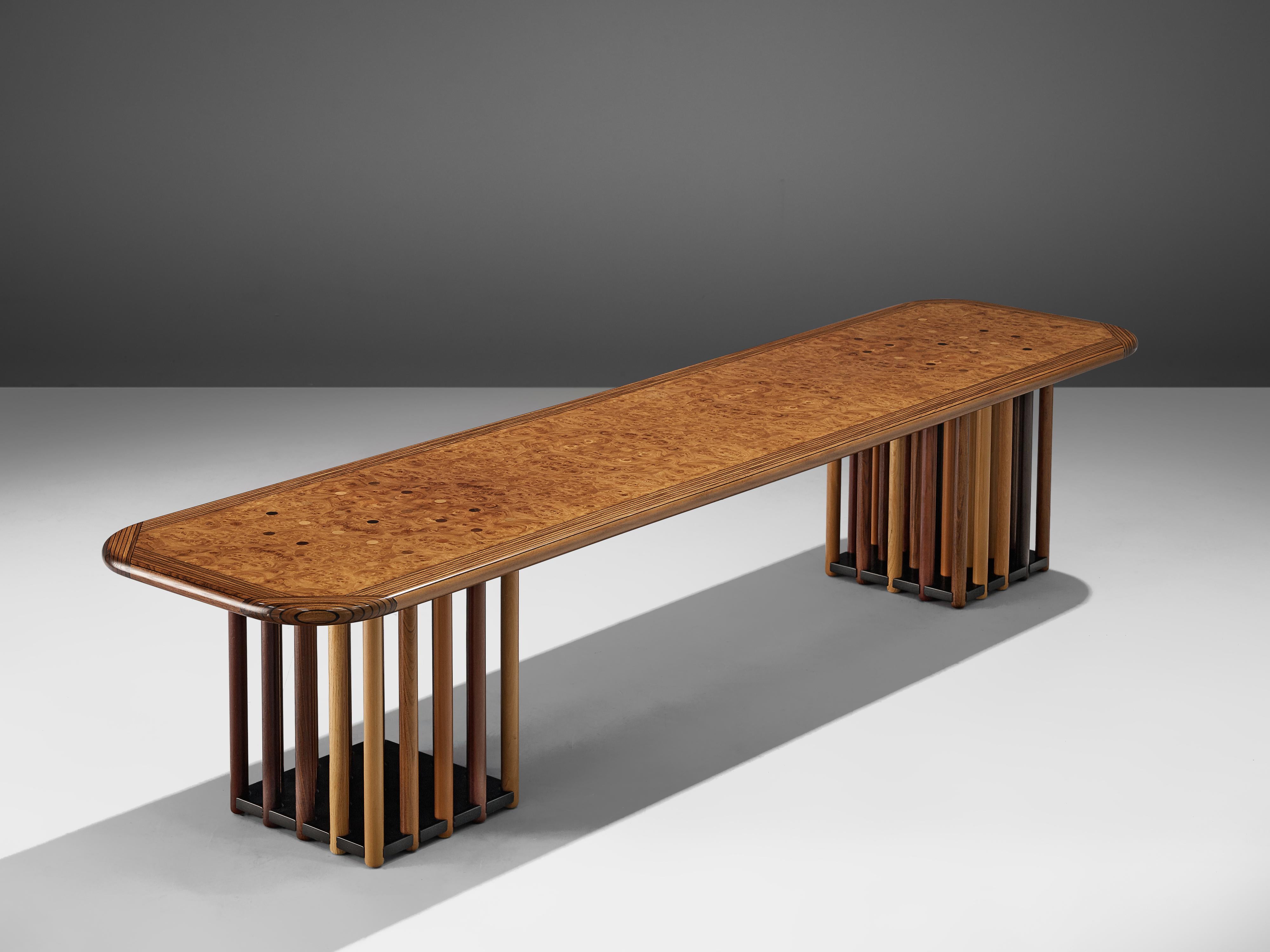 Afra and Tobia Scarpa, 'Artona' coffee table, maple burl, birch, beech, oak and fruitwood, Italy, circa 1975.

Every detail about this design is extraordinary. The long table features two feet that exist out of circular rods. The different types