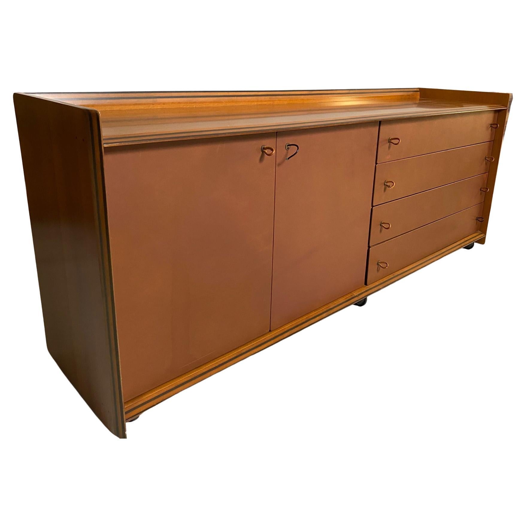 Afra & Tobia Scarpa, sideboard model 'Artona', walnut, leather, Italy, circa 1975.

 This sideboard with leather front is designed as part of the Artona line by The Artona line by Afra and Tobia Scarpa was the first line ever produced by Maxalto,